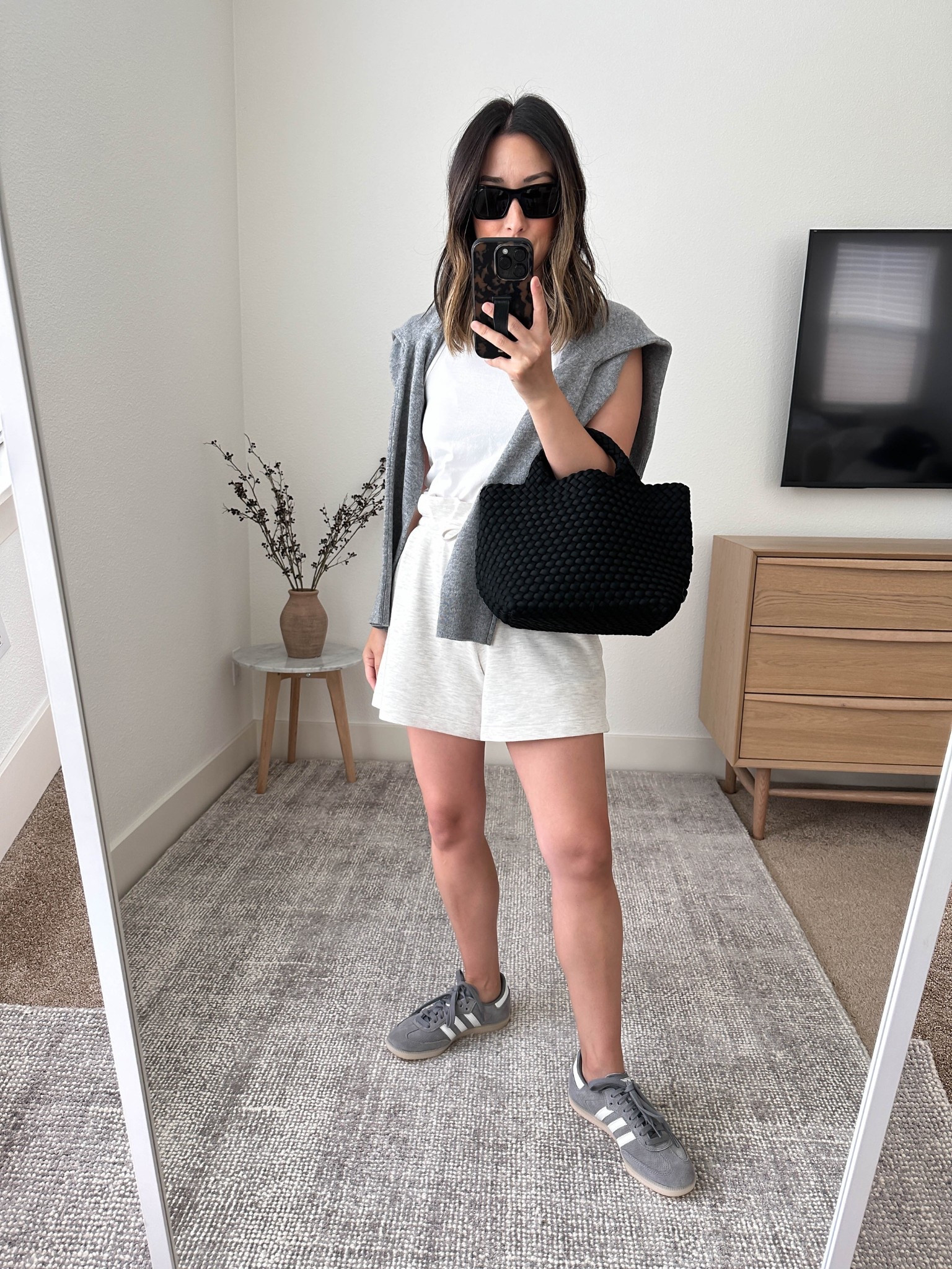 Elevated leisurewear for warm weather. Shorts are an old style from Varley, but linking their current style. 

Everlane tank xs
Varley shorts xs
Adidas Samba sneakers 4.5 mens
Eileen Fisher sweater. xs (old)
Naghedi small black

#LTKPetite #LTKShoeCrush #LTKItBag