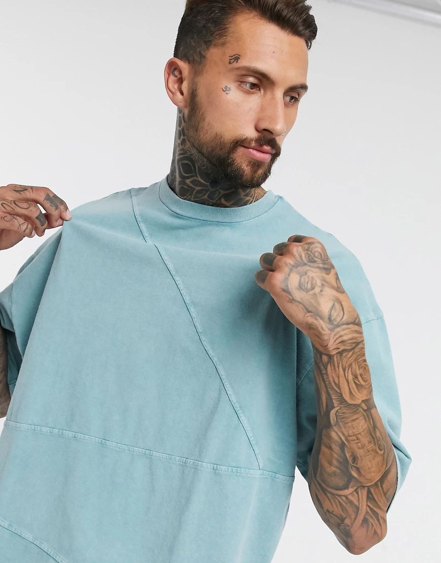 ASOS DESIGN oversized t-shirt with half sleeve in heavyweight blue acid wash with seam detail | ASOS (Global)
