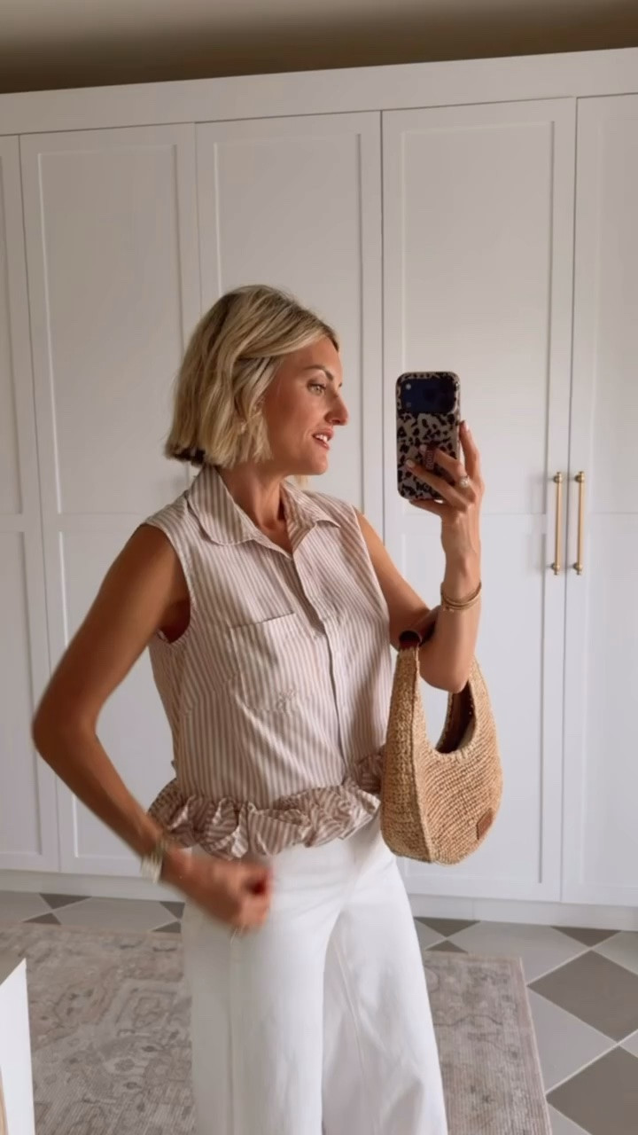 Can’t get over this ruffle top from Anthropologie! How unique and fun is the ruffle and button down detail? This is such a fun top for work and even could be paired with white denim shorts for weekend wear! Wearing XS/4.

Loverly Grey, Anthropologie, summer workwear, summer fashion, summer outfit ideas, white jeans outfit, white denim outfit

#LTKootd #LTKSeasonal