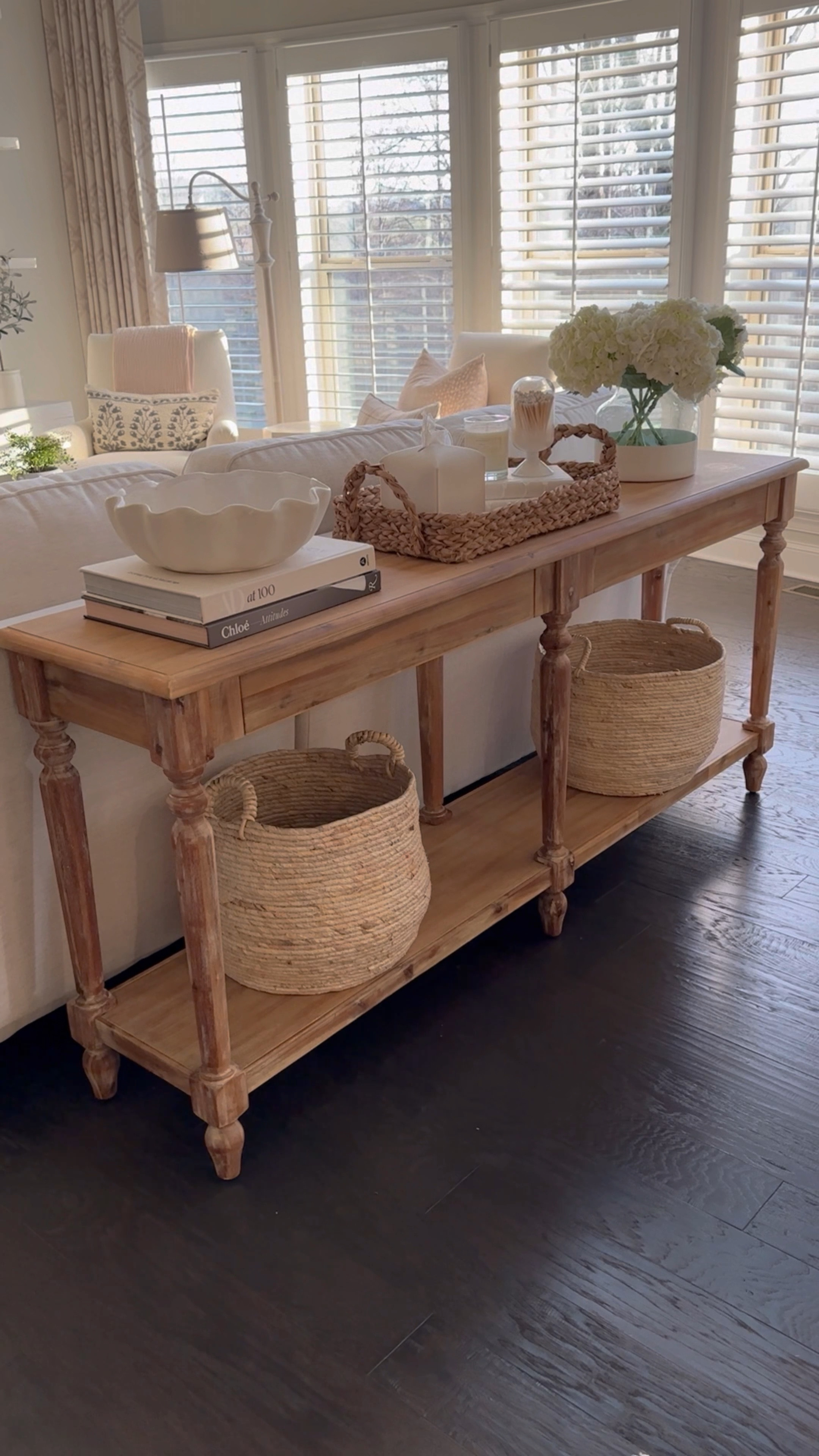 Style this console table with me! I love this affordable wood table behind our couch in the living room. I use the sea grass baskets to store out blankets and the bowl is a great spot for remotes, etc.  

#LTKhome