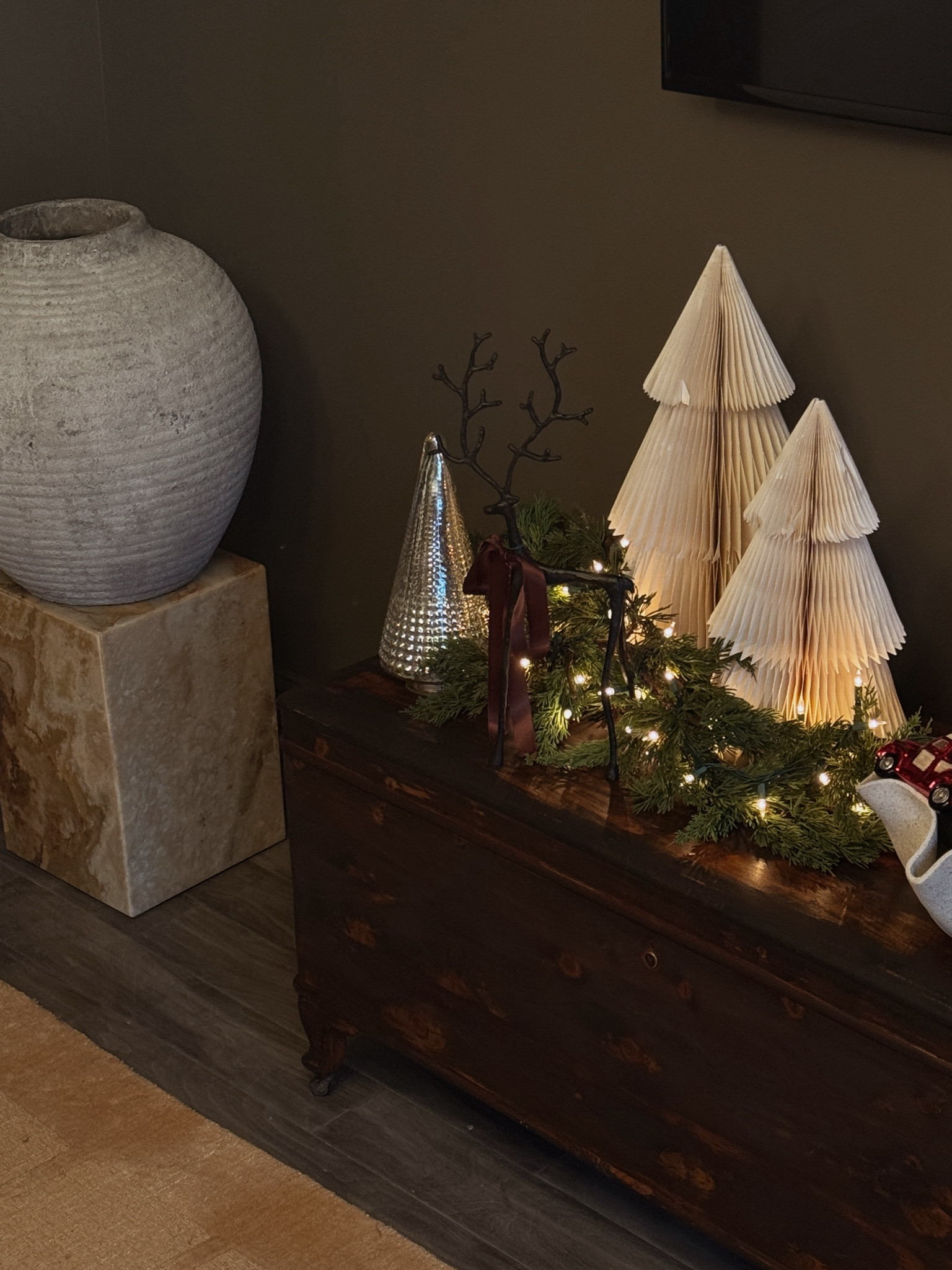 New project loading! We found this gorgeous cedar chest at an estate sale and wanted to give it a second life. We decided it needed a good sanding and fresh stain. @homedepot is currently having a BOGO tools event, so we picked up a starter battery kit and got a RYOBI sander for FREE! It's the perfect tool for this project. Of course, once we finished, we had to decorate the new chest with all of the holiday decor. Now our room feels extra cozy for the holiday season  #WhatAreYouWorkingOn #TheHomeDepot #TheHomeDepotPartner 
