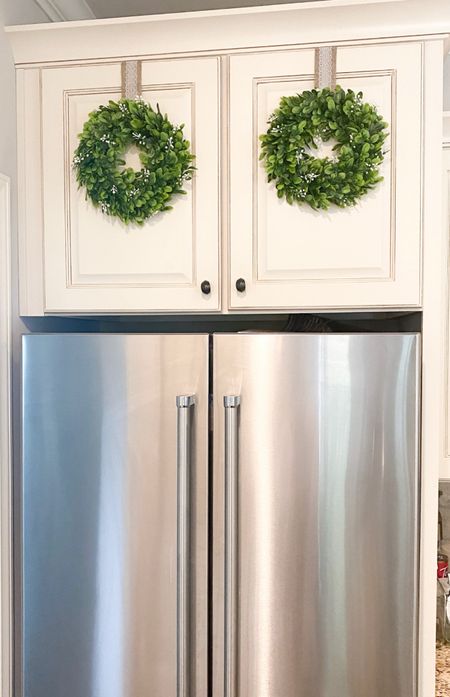 Add a festive touch to your kitchen cabinets by adding some small wreaths! You can easily switch them out for the seasons!

#LTKSeasonal #LTKCyberWeek #LTKhome