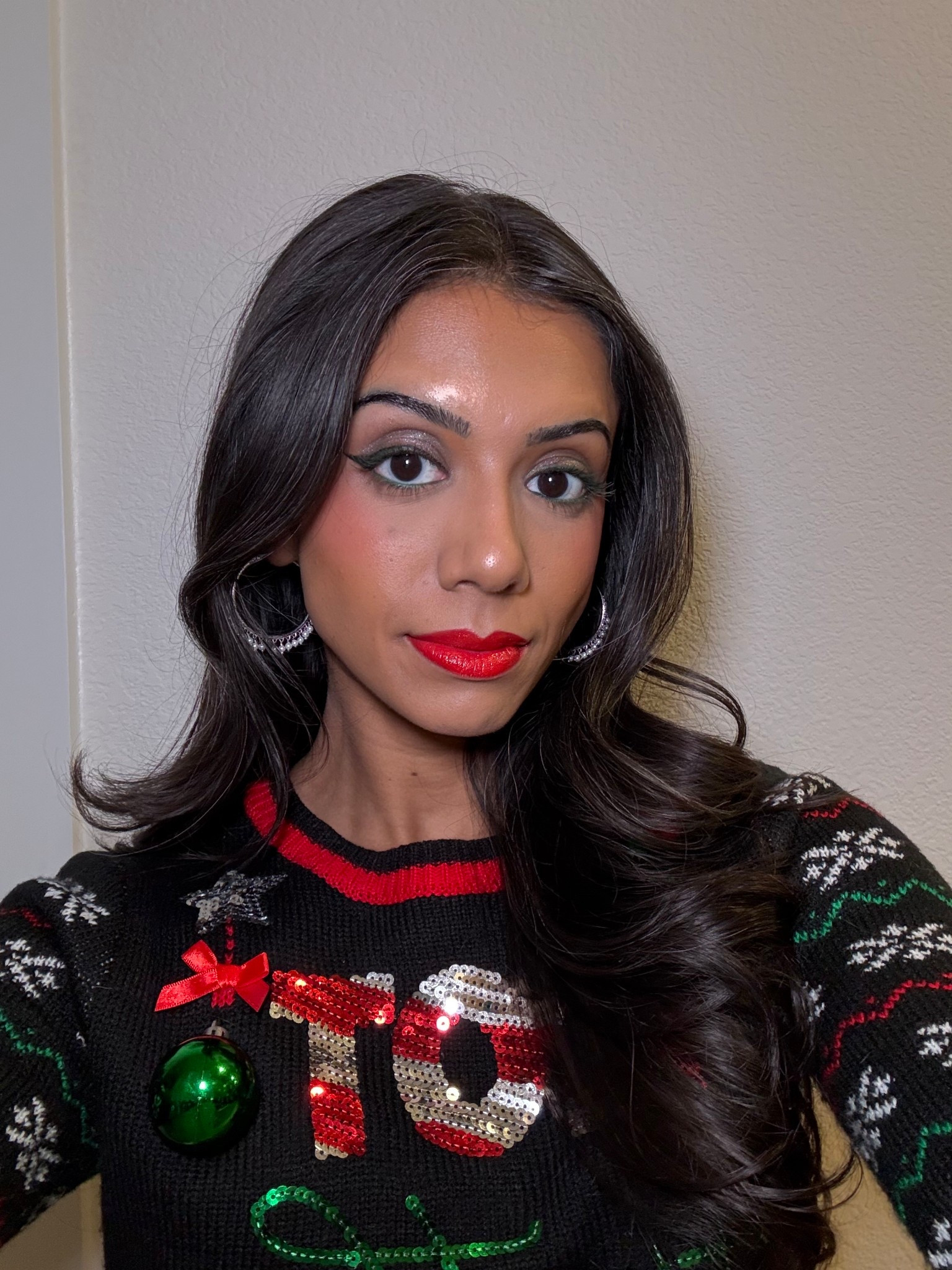 Holiday makeup inspo on brown skin ft a red glitter lip and green mascara and eyeliner. All affordable products

#LTKBeauty #LTKSeasonal #LTKHoliday