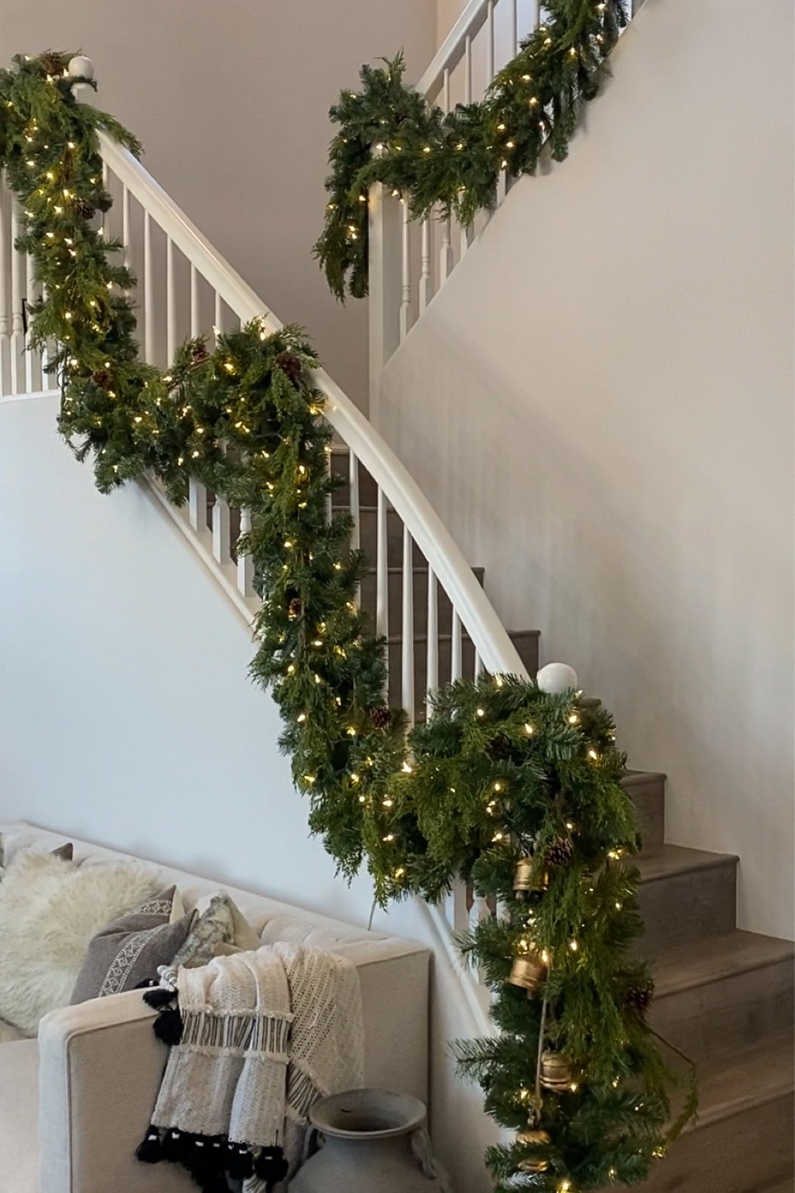 My holiday garland is done! I love using these random LED twinkle lights because not every light twinkles so it’s the perfect amount of movement! Come see them in motion on my IG!

Garland. Cedar garland. Realistic garland. Christmas lights. String lights. Gold hanging bells. Christmas decor. 

#walmart #walmarthome

#LTKhome #LTKHoliday #LTKstyletip