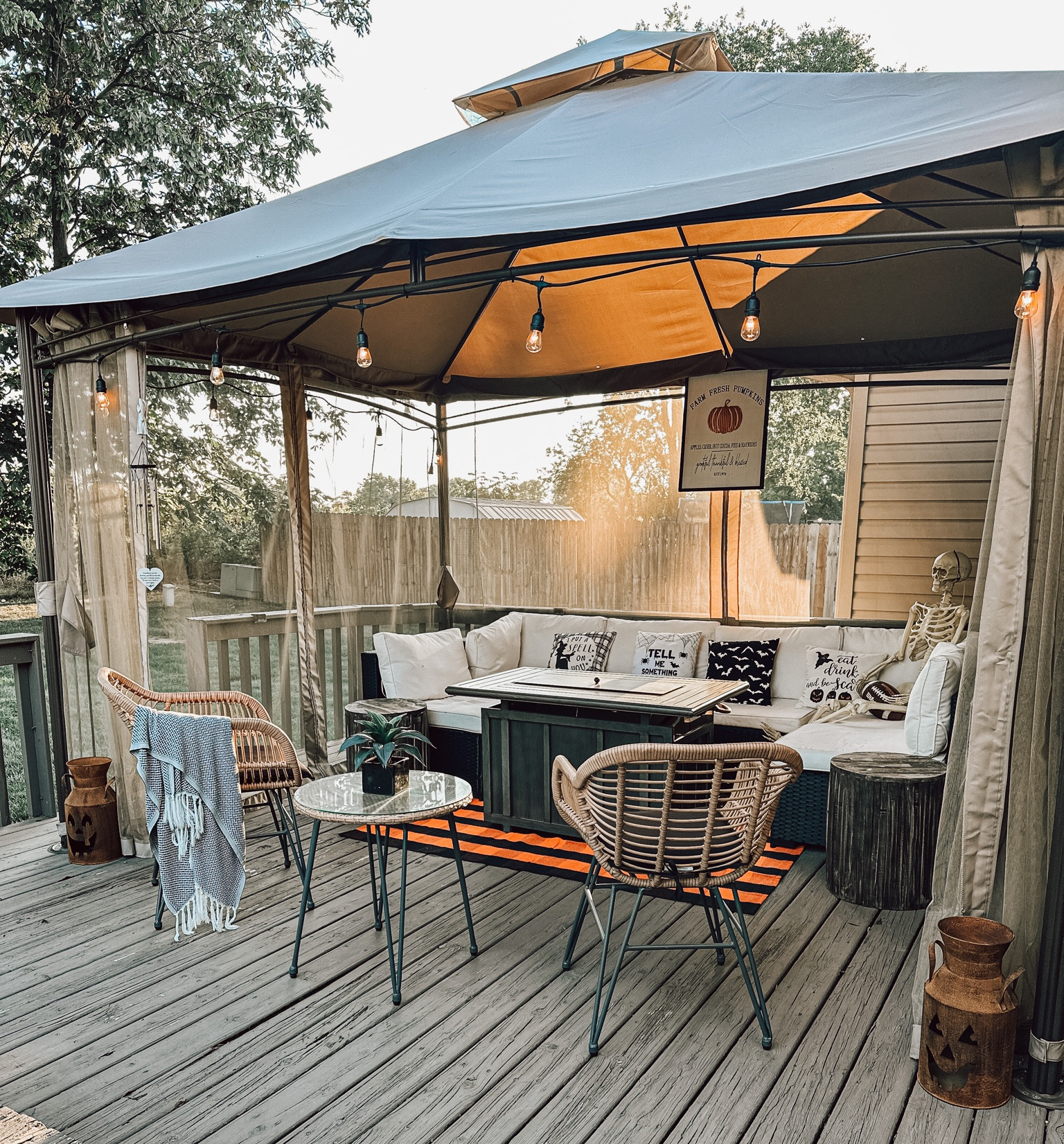 Seasonal deck decor // Halloween styled deck // Halloween outdoor decor // outdoor seasonal decor // autumn decor // outdoor spaces 

#LTKfindsunder50 #LTKhome #LTKSeasonal
