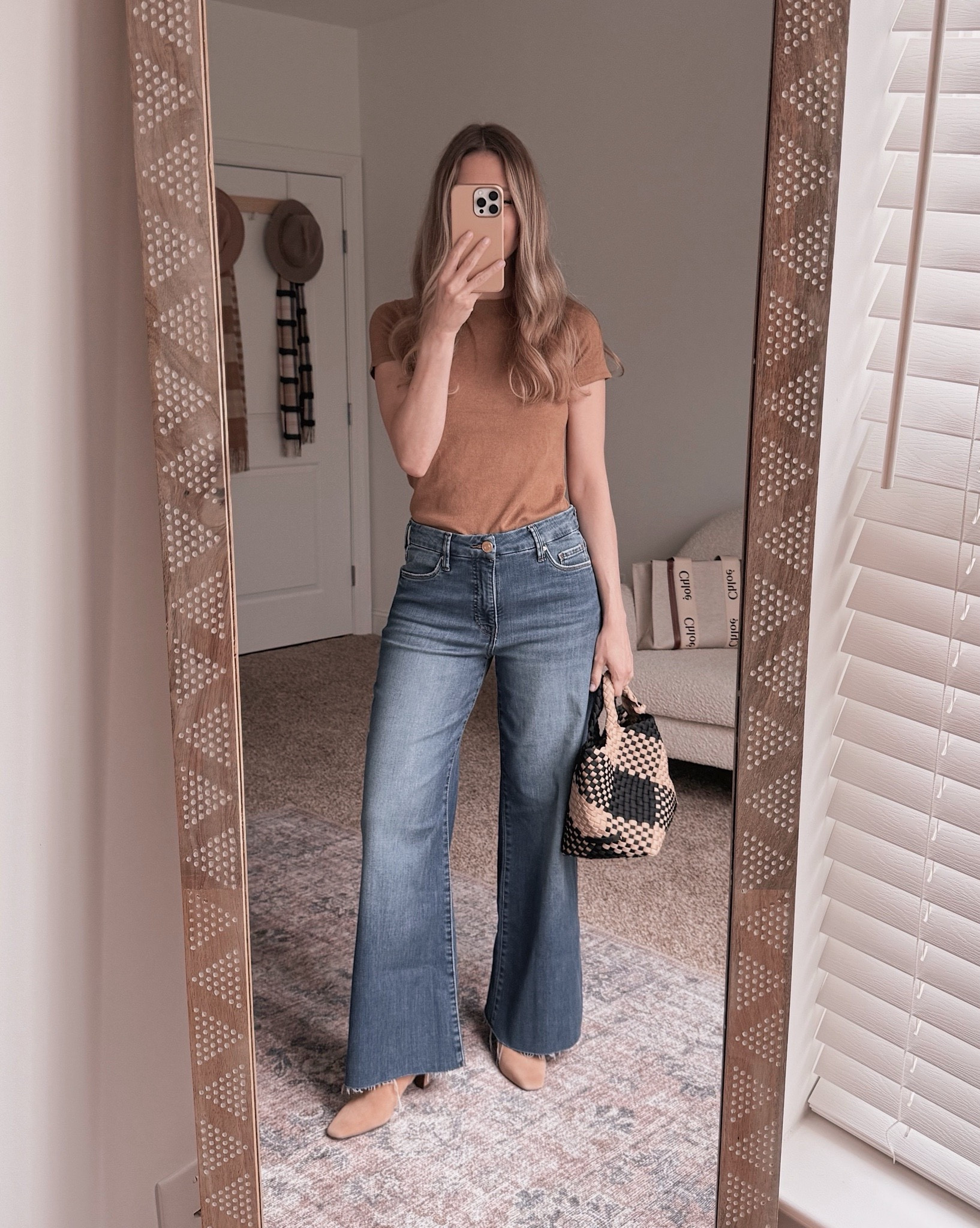 This top is on sale and perfect for fall weather! I love wearing a neutral outfit for casual Fridays, especially with wide leg jeans

Sunset and stilettos, dark denim, neutral boots 

#LTKTravel #LTKWorkwear