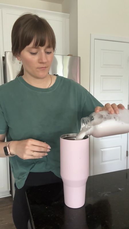 Making myself a pink drink in my HydroJug. I think I love it more than my Stanley 🙈 I still love my Stanley don’t get me wrong, but the HydroJug DOESN’T LEAK 🙌🏻

Shirt Im wearing fits TTS - I’m wearing large, but medium would be better 🥰

#LTKbeauty #LTKstyletip #LTKActive