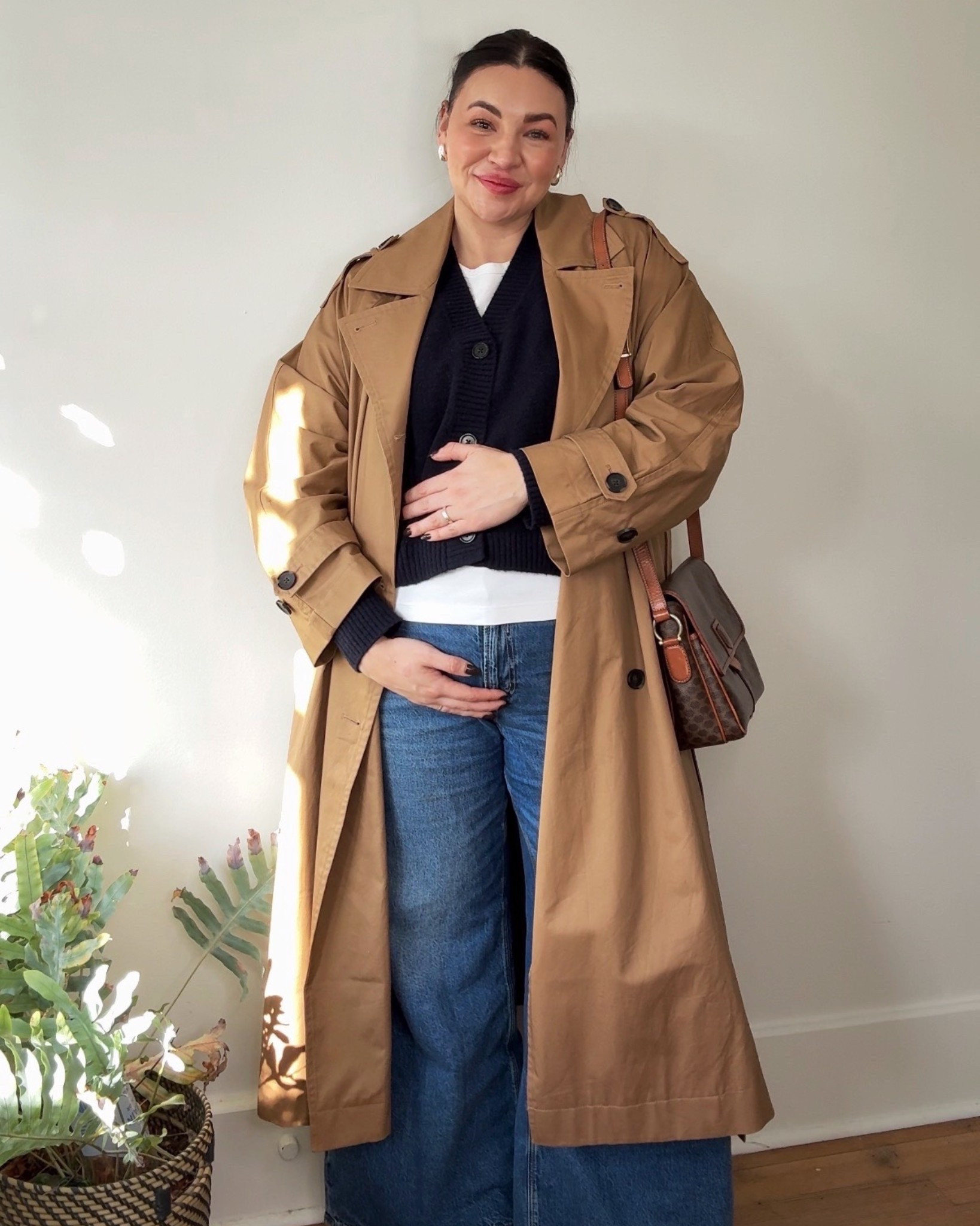 This cardigan is one of my fav budget finds I’ve had in a while! I love that the cardigan is a deep v so it layers perfectly with a tee for a more textured look and the boxy fit has an effortless quality! I picked it up on navy to match with the most pieces possible but loved the green and purple version it came in too!

This pair of jeans was a cult favorite last year for me in the high rise version because of how stretchy and soft the material was, so when I realized they made it in a low cut I picked up the exact same pair in a low rise for pregnancy and it’s become my fav pair of maternity denim without being “maternity”

Wearing jeans in the low rise size 18
Sweater size XL
Tee size XL
Coat size XL

#LTKgrwm #LTKMidsize #LTKBump