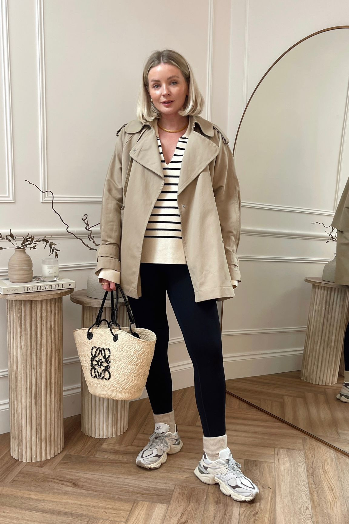 Casual spring outfit idea - black another version leggings, new balance 9060 trainers, arket striped v neck jumper, arket short trench coat & Loewe basket bag  

#LTKSeasonal #LTKeurope #LTKstyletip
