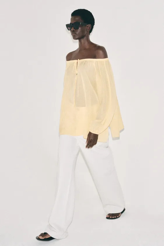ZARA WOMAN COLLECTIONBlouse made from 34% linen blend yarn. Featuring a straight neckline with ad... | Zara UK