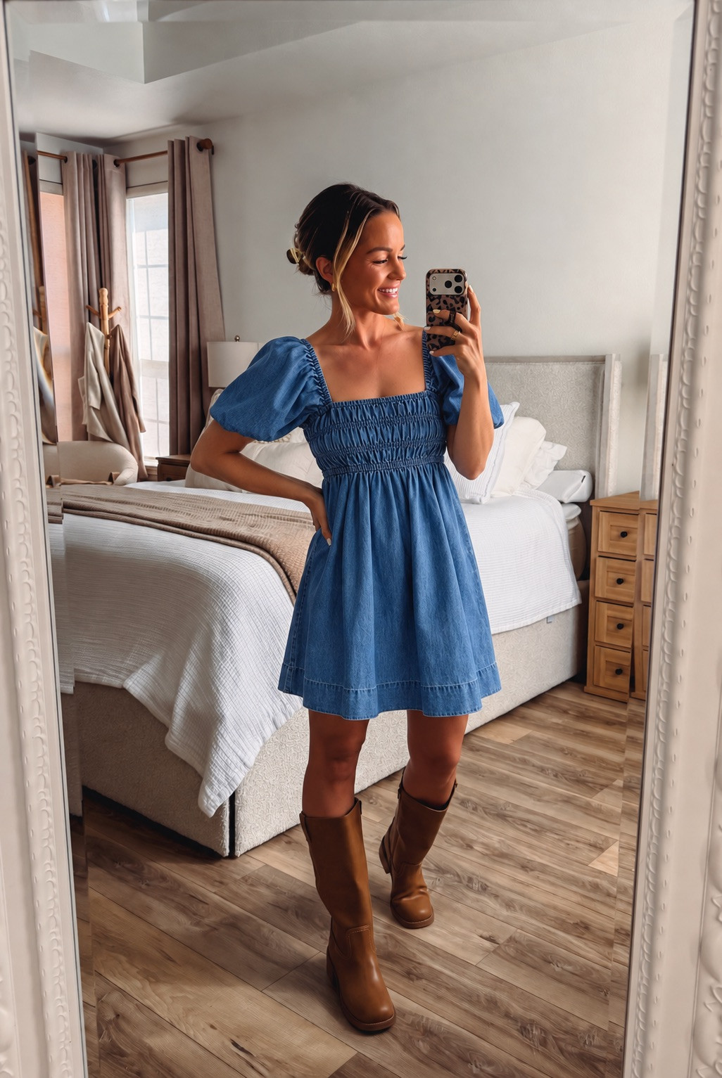 The prettiest denim dress for fall! This puff sleeve mini has the sweetest smocked bodice and square neckline that feel so feminine and flattering. Tall cognac boots give it that perfect western-inspired edge. Perfect for weekend brunch, apple picking, or a fun date night out on the town! 

 #LTKootd #LTKmomlife #LTKSeasonal