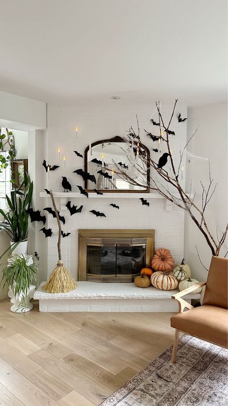 Spooky season is here and I finally put up my Halloween decor around the fireplace. I love these bats- so low effort but so impactful. I like that they came in different sizes too. 

I also hung floating candles for some romantic spooky vibes and those crowd look so realistic!

#LTKhome #LTKSeasonal #LTKHalloween