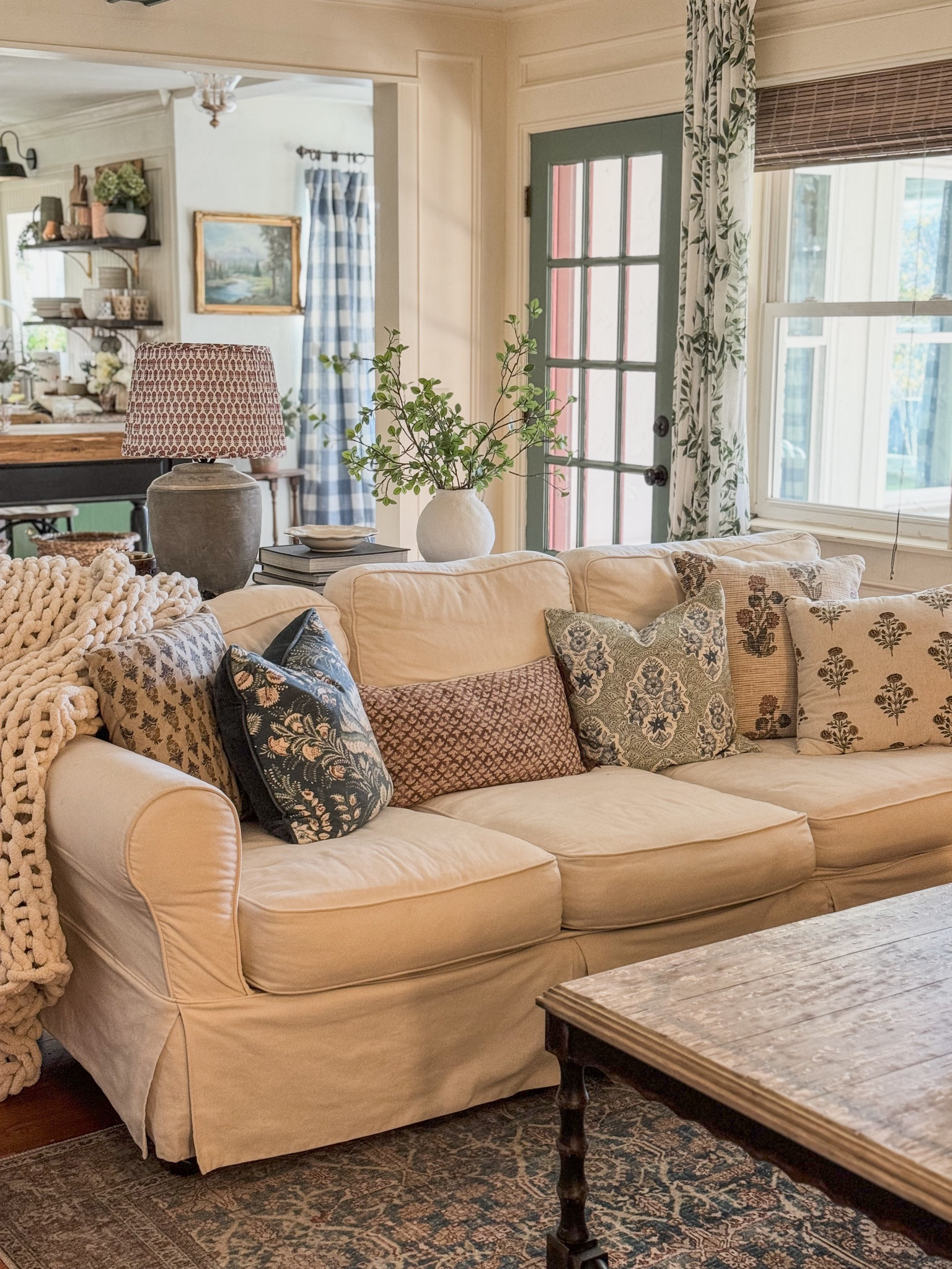 Throw pillows, block print floral pillows, curtains, coffee table, Loloi rug, pleated lampshade, chunky throw blanket, living room decor and inspo

#LTKfamily #LTKsalealert #LTKhome