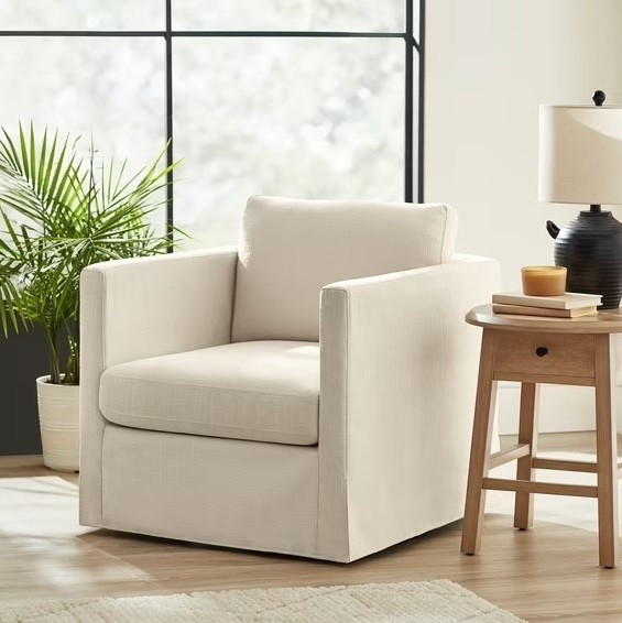 Grab this stunning armchair currently on sale for less than $200! Not only that but it's fully slipcovered, comes in 3 different fabrics and it swivels!  #LTKMostLoved

#LTKStyleTip #LTKSaleAlert #LTKHome