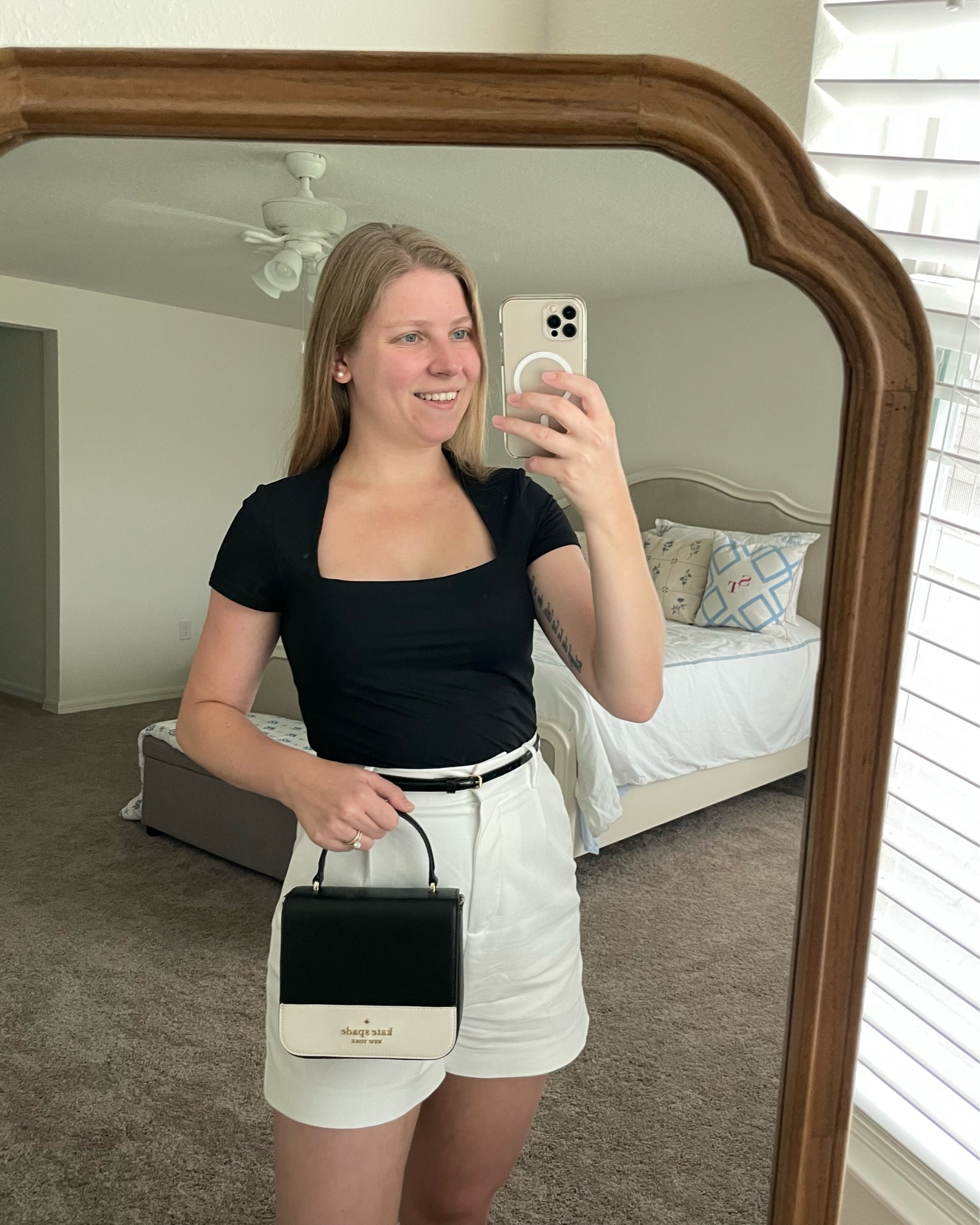 Summer to Fall transition outfit. Meredith Blake, Princess Diana inspired look. Square neck cap sleeve basic black top, white high waist shorts  

#LTKSeasonal #LTKstyletip