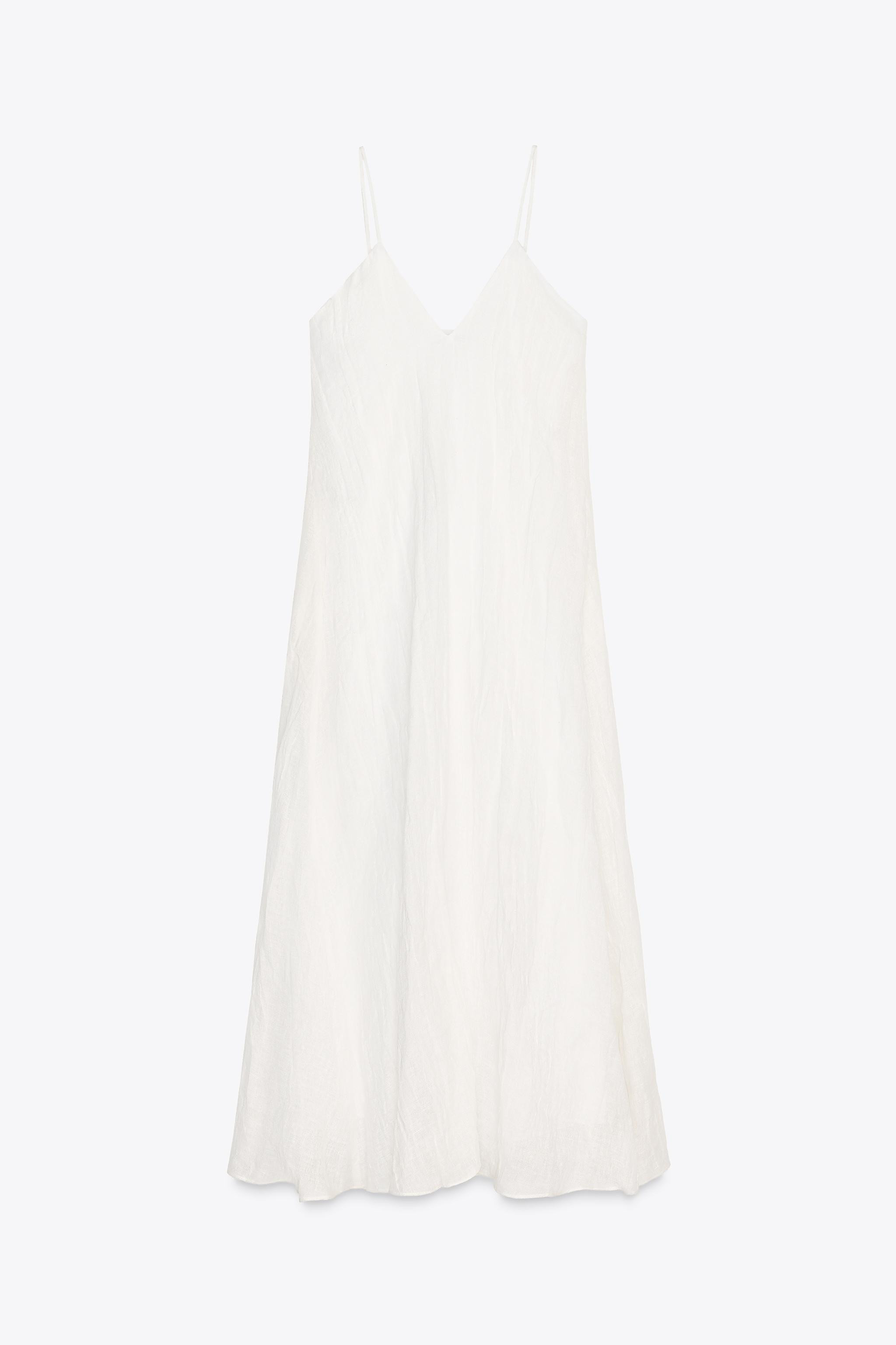 ZARA WOMAN COLLECTIONLong dress made of linen blend yarn. Round neck and spaghetti straps. Round ... | Zara US