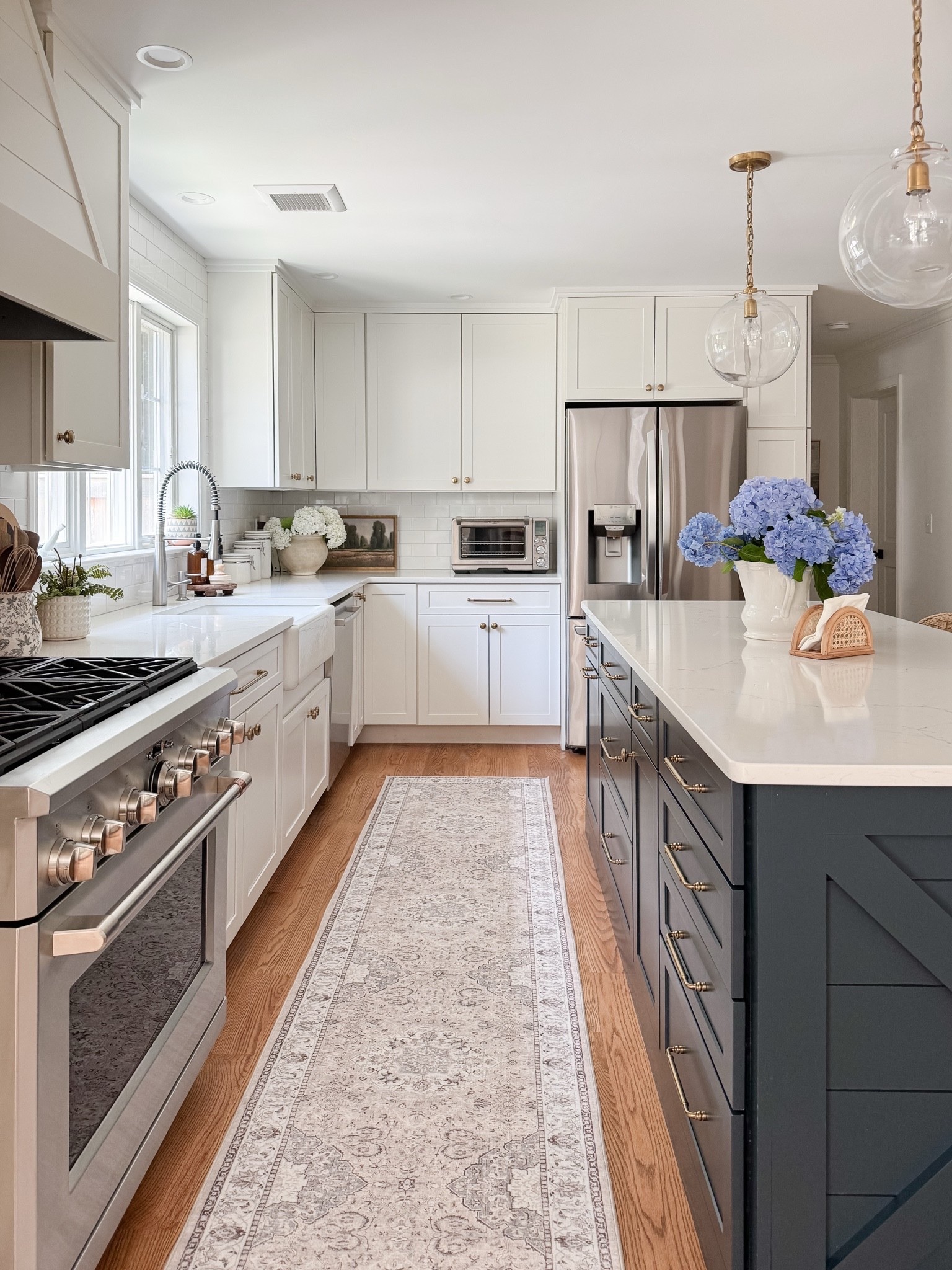 Coastal kitchen styled with navy island, white cabinets, neutral runner rug, and simple kitchen decor for a light and layered coastal space.

coastal kitchen decor, navy kitchen island, neutral kitchen runner rug, white cabinet kitchen, coastal kitchen styling, neutral kitchen decor, light coastal kitchen design, kitchen island runner rug, sherricalnanhome

#LTKHome