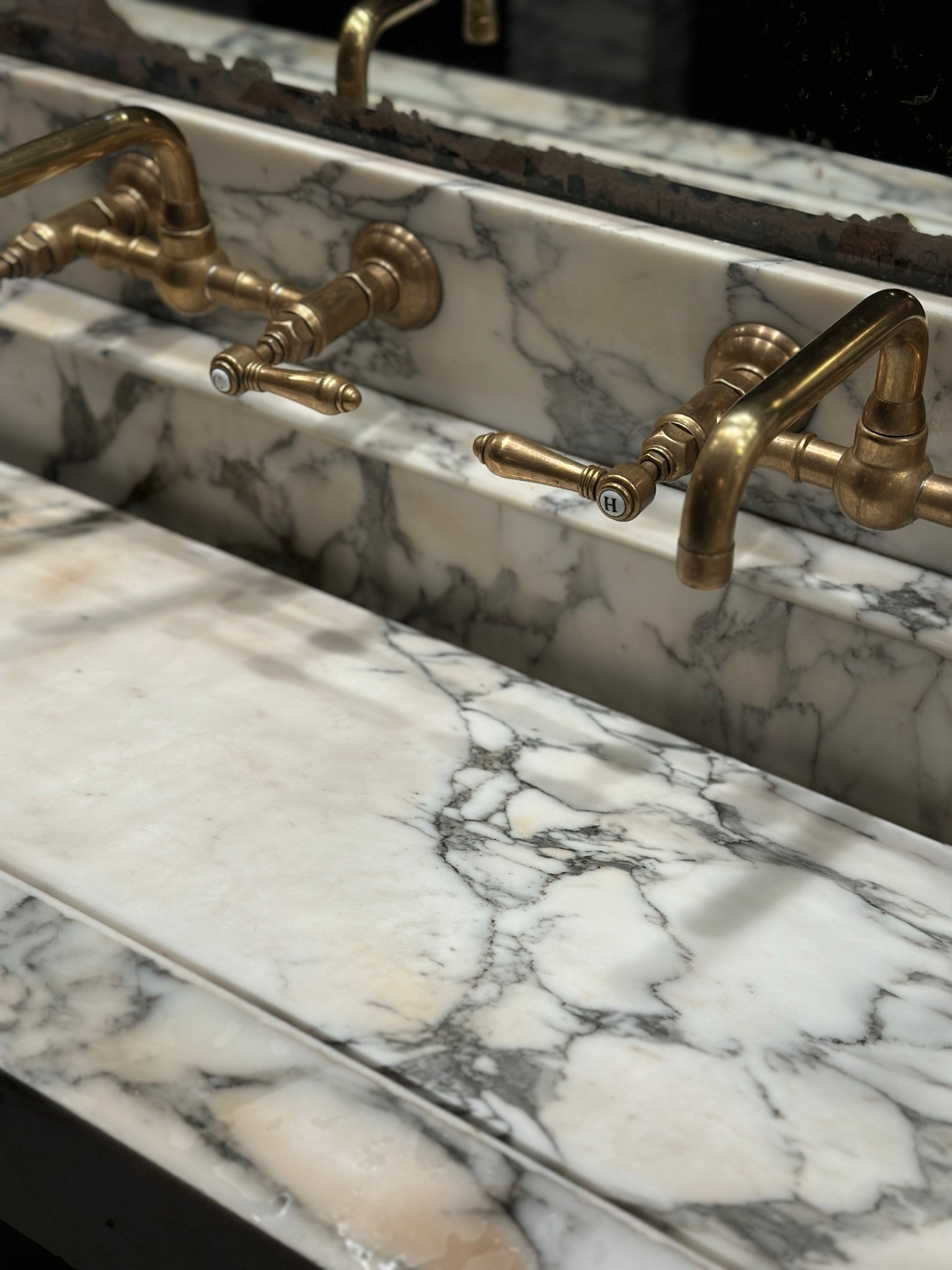 Classic brass wall mounted faucets for a timeless aesthetic… from my saved folder. 

#LTKHome