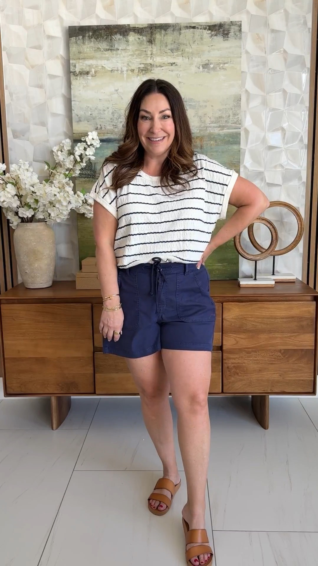 Easy, everyday casual 🤍 This striped tee + pull-on shorts combo is one of those outfits you’ll reach for on repeat. Comfy, flattering, and perfect for running errands or grabbing lunch. Paired with a neutral crossbody + slides to keep it effortless.

Sizing: top tts, L // shorts size up, 14 

#LTKOver40 #LTKSeasonal #LTKMidsize