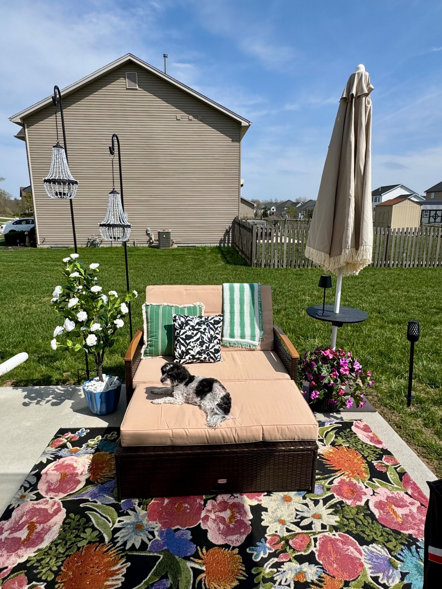 This patio couch converts into a daybed & has the most unique features like 2 pop up side tables & self storage for all the cushions! The floral rug is everything! No green thumb here so I use the most realistic faux flowers & boxwoods. The umbrella table is the COOLEST!  And don’t get me started on those solar powered chandeliers! 

#LTKFindsUnder50 #LTKSeasonal #LTKHome