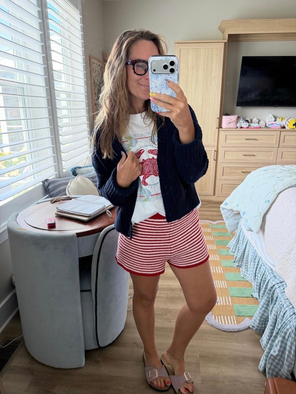 This is the kind of casual outfit I reach for all summer long—striped knit shorts, a fun graphic tee, a cozy navy cardigan for chilly mornings, and comfy slides. Easy, cute, and perfect for coffee runs, beach mornings, or weekend errands.

striped shorts, knit shorts, red and white shorts, graphic tee, lobster graphic tee, navy cardigan, lightweight cardigan, casual summer outfit, coastal style, East Coast style, preppy outfit, comfy everyday outfit, beach outfit, vacation outfit, mom style, easy summer fashion, slide sandals, effortless casual look.

#LTKootd #LTKmomlife #LTKPetite