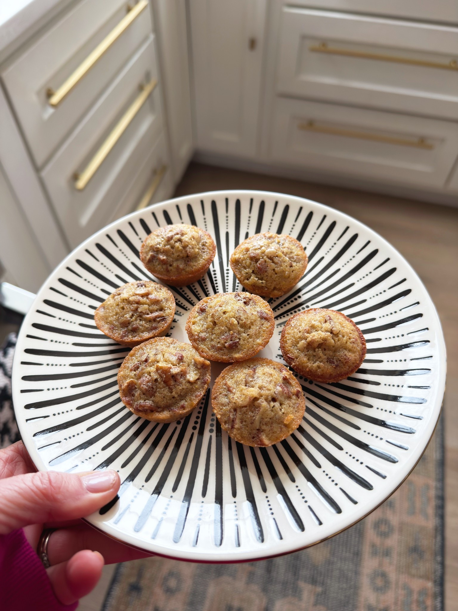 Mom’s Pecan Muffins

Ingredients:
1 cup packed light brown sugar
1/2 cup all-purpose flour
2 cups chopped pecans
2/3 cup butter, softened
2 eggs, beaten

Directions:
1. Preheat oven to 350° F. Grease mini or regular muffin cups generously 
2. In medium bowl, stir together brown sugar, flour, and pecans
3. In separate bowl, beat butter and eggs together
4. Stir in dry ingredients until combined
5. Spoon into muffin cups about 2/3 full
6. Bake for 12-14 minutes for mini muffins or 15-17 minutes for regular size muffins
7. Run knife around the edge of each muffin and pop it out 


#LTKOver40 #LTKdayinmylife #LTKHome