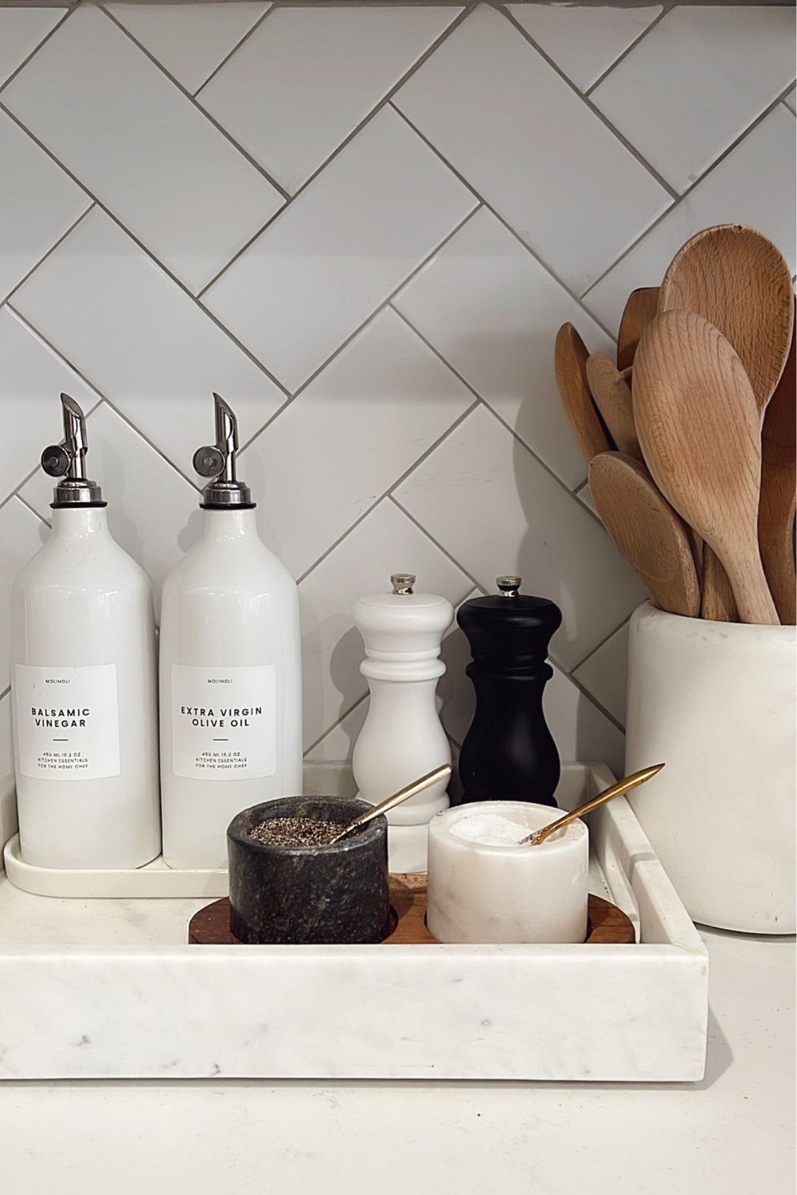 Our kitchen counter set up. Love these oil dispensers, salt and pepper mills and the marble pieces. Kitchen decor. Kitchen gear  

#LTKhome #LTKFind #LTKstyletip
