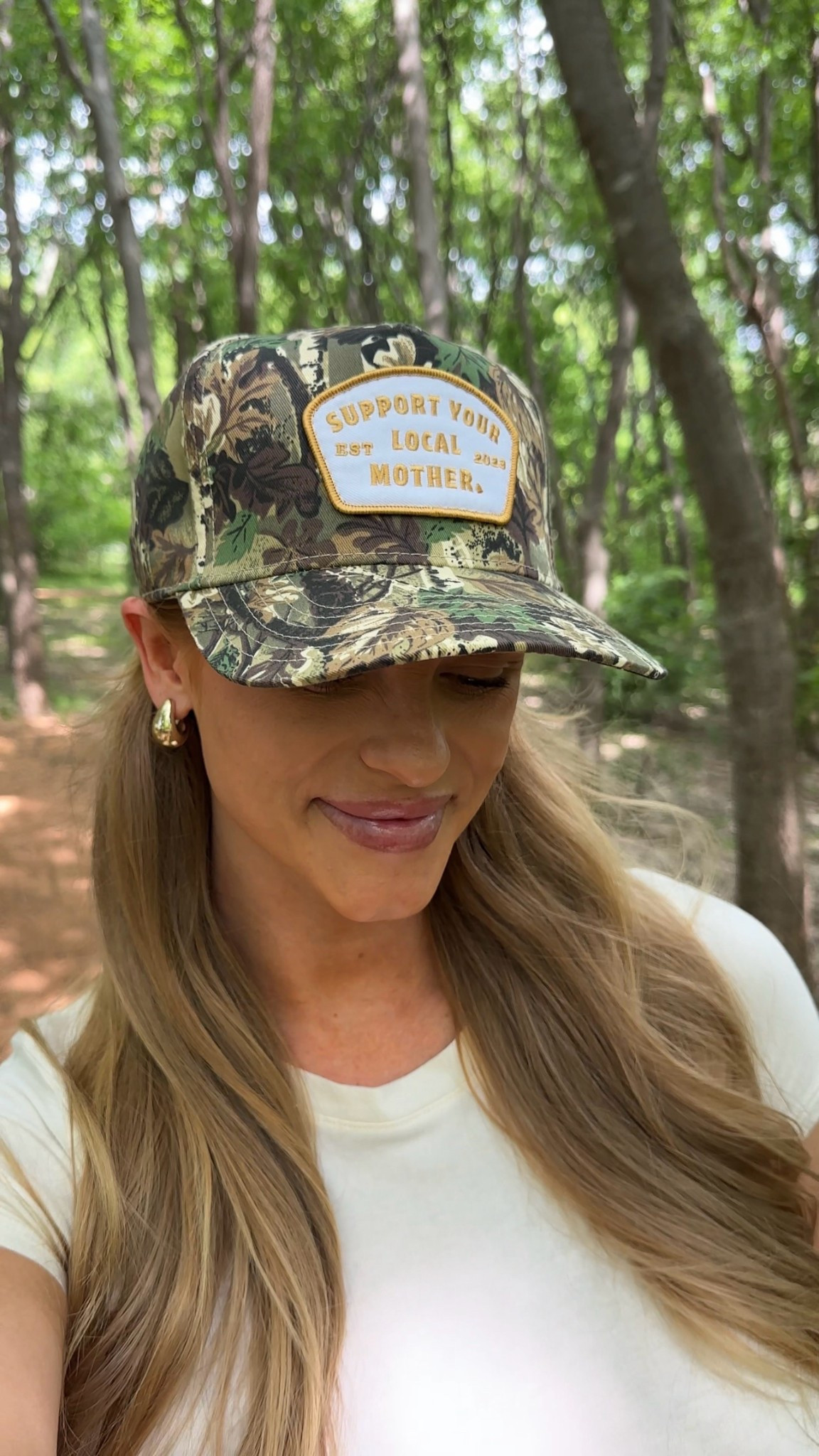 Obsessed with this camo trucker hat that says “Support Your Local Mother” — such a fun and meaningful twist on a classic outdoorsy style. Whether you’re heading to the farmer’s market, on a nature walk, or just running errands, this hat is the perfect way to show off some mom pride while keeping it casual and cute. The fit is comfy, the colors go with everything, and the embroidered patch gives it that vintage feel I love. It also makes such a great gift idea for new moms, expecting mamas, or Mother’s Day! I’ll definitely be wearing this all summer long with leggings, biker shorts, or a tee dress and it’s definitely one of those accessories that sparks conversation in the best way.

#SupportYourLocalMother #CamoHat #TruckerHatStyle #MomLifeStyle #MotherhoodFashion #CamoOutfit #CuteHatsForWomen #MomGiftIdeas #MotherhoodMerch #MaternityStyle #LTKSeasonal #LTKMotherhood #LTKSpringStyle 

#LTKBump #LTKStyleTip