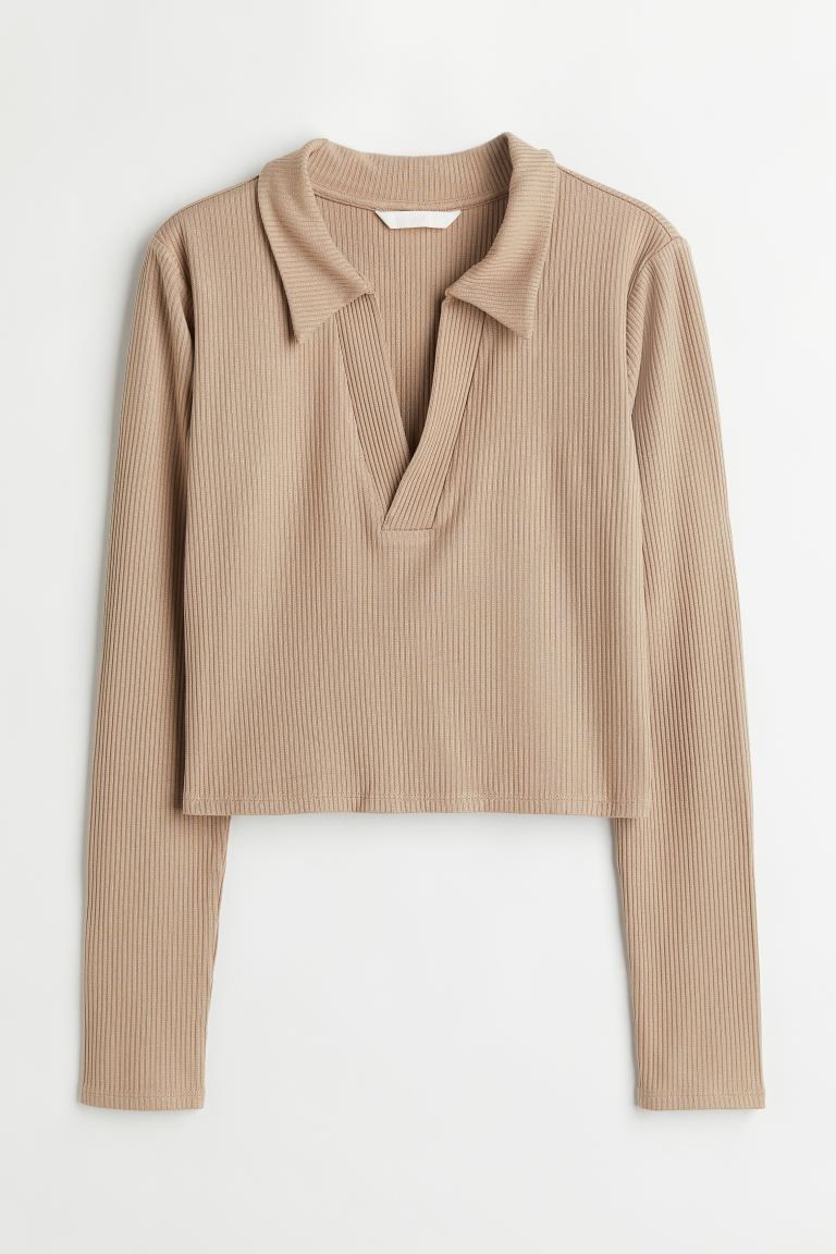 Short top in ribbed viscose jersey. Collar, V-neck opening at front, and long sleeves. | H&M (US)