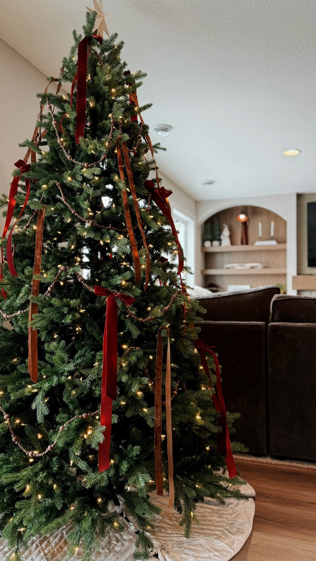 This year’s tree is all about quiet, classic magic.
Our 7’ Christmas tree from @nationaltreecompany has such a timeless, nostalgic shape that it only needed ribbon and a simple wooden garland to feel fully dressed for the season. The soft, color‑changing lights add just enough sparkle while still letting the rich greenery and sculpted branches be the focus.
@nationaltreecompany also has coordinating pieces like tree skirts, garland, and wreaths, so the whole home can echo that same collected, classic look without feeling overdone. It’s the kind of holiday decor that feels elevated but still warm and welcoming—just the way this season should feel. #ad
#nationaltreecompany #kendrainc #christmasdecor #holidaydecor #tistheseason 

#LTKHome #LTKHoliday #LTKSaleAlert