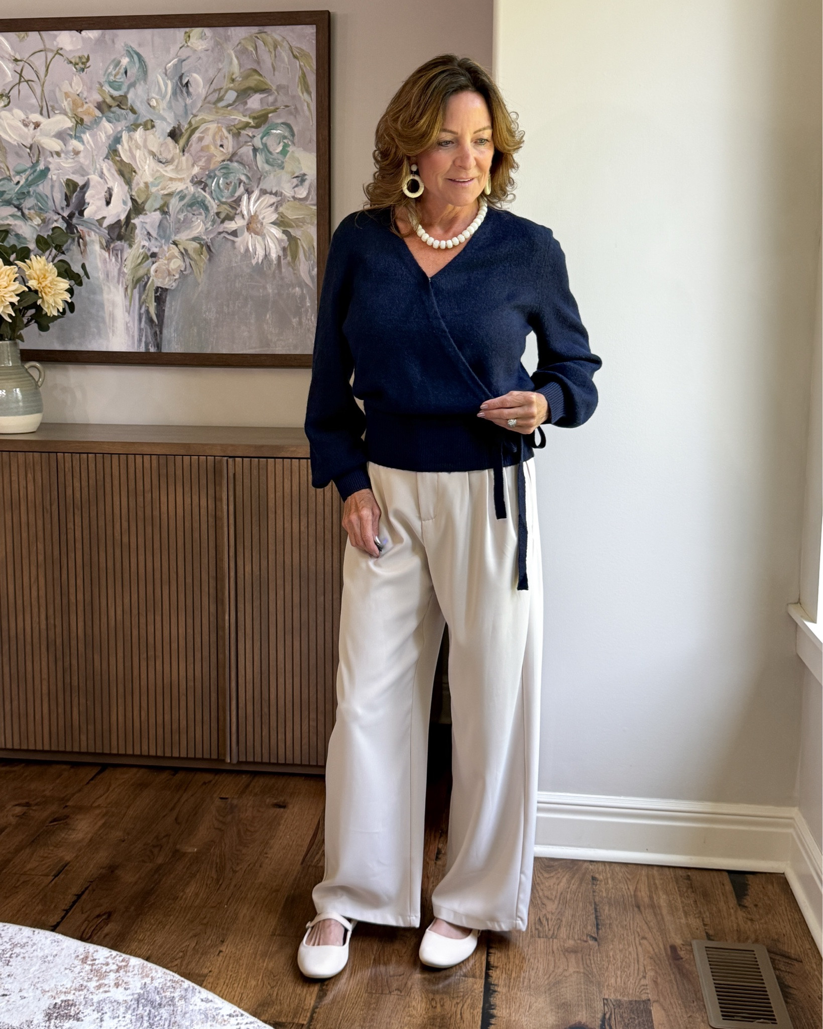 A Travel Outfit That Doesn’t Look Like a Travel Outfit

This is exactly what I want in my suitcase—comfortable pieces that still look polished enough for sightseeing, lunch or dinner. The relaxed cream pants are easy for long days, while the navy wrap sweater gives the outfit some shape and can layer when temperatures drop. Comfortable, versatile and no “travel clothes” required.

#travelstyle #over50style #traveloutfit #packinglight #travelwardrobe