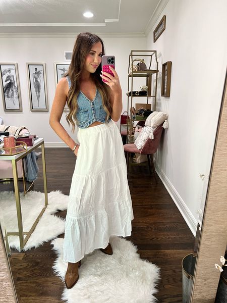 Cowgirl meets boho with a cute denim vest, white, flowy maxi skirt and cowgirl boots!

Wearing an XS in vest and S in skirt. 7 in boots

#LTKStyleTip #LTKShoeCrush #LTKFestival