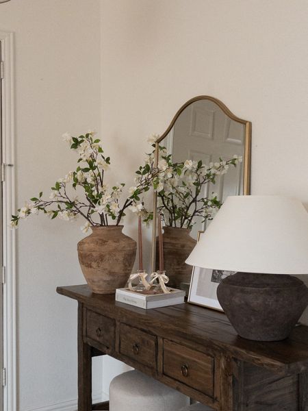 Entryway styling // Wood console table styling! 

solid wood console table, mcgee & co, ottomans, lamp, large table lamp, candlesticks, vase, spring stems, frame, art print, etsy art, mirror, home finds, home decor styling, home decor deals 

#LTKHome #LTKFindsUnder100 #LTKStyleTip