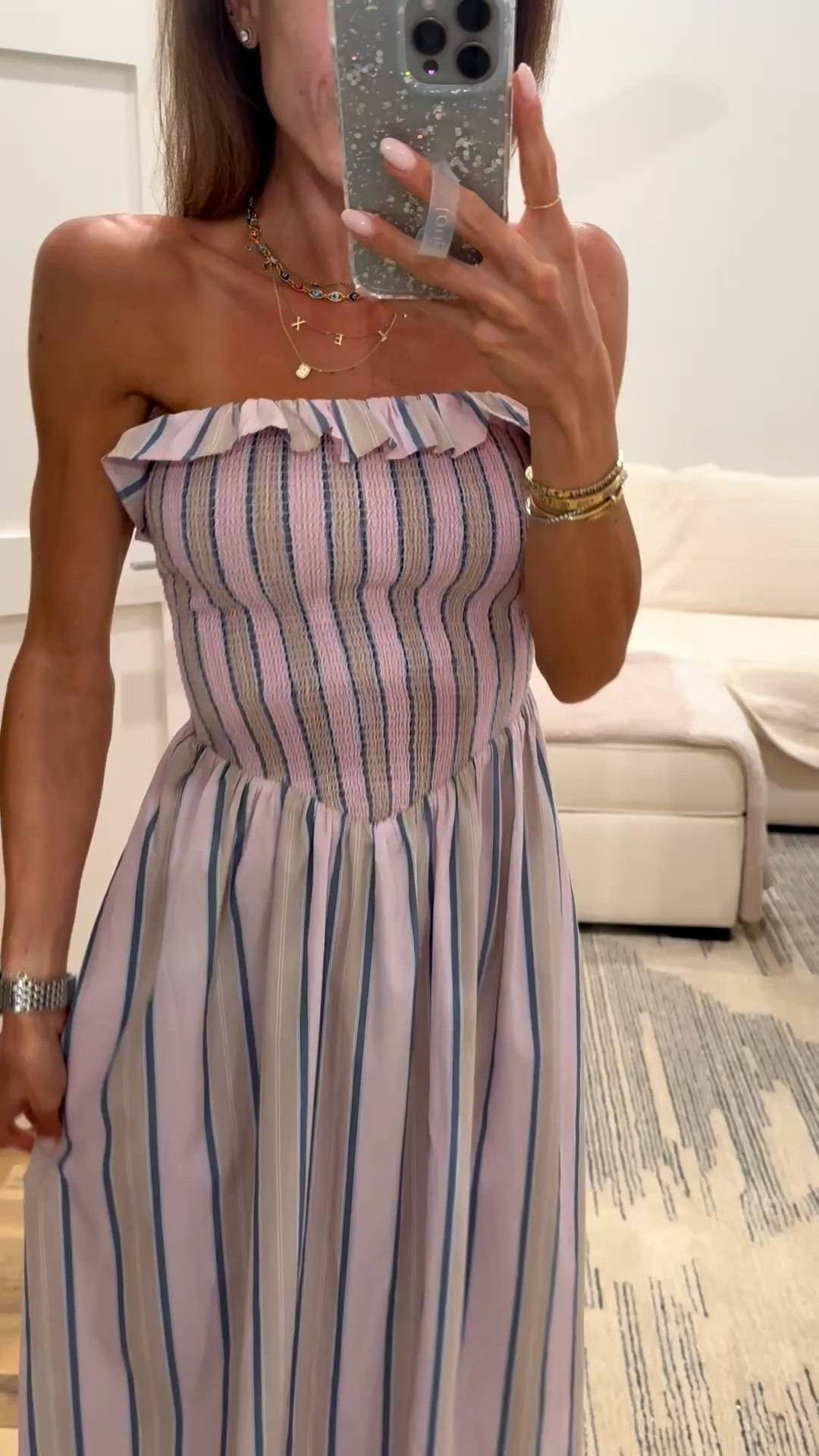 The cutest stripe maxi dress with a ruffle edge and smocked waist wearing xxs petite

#LTKPetite #LTKootd