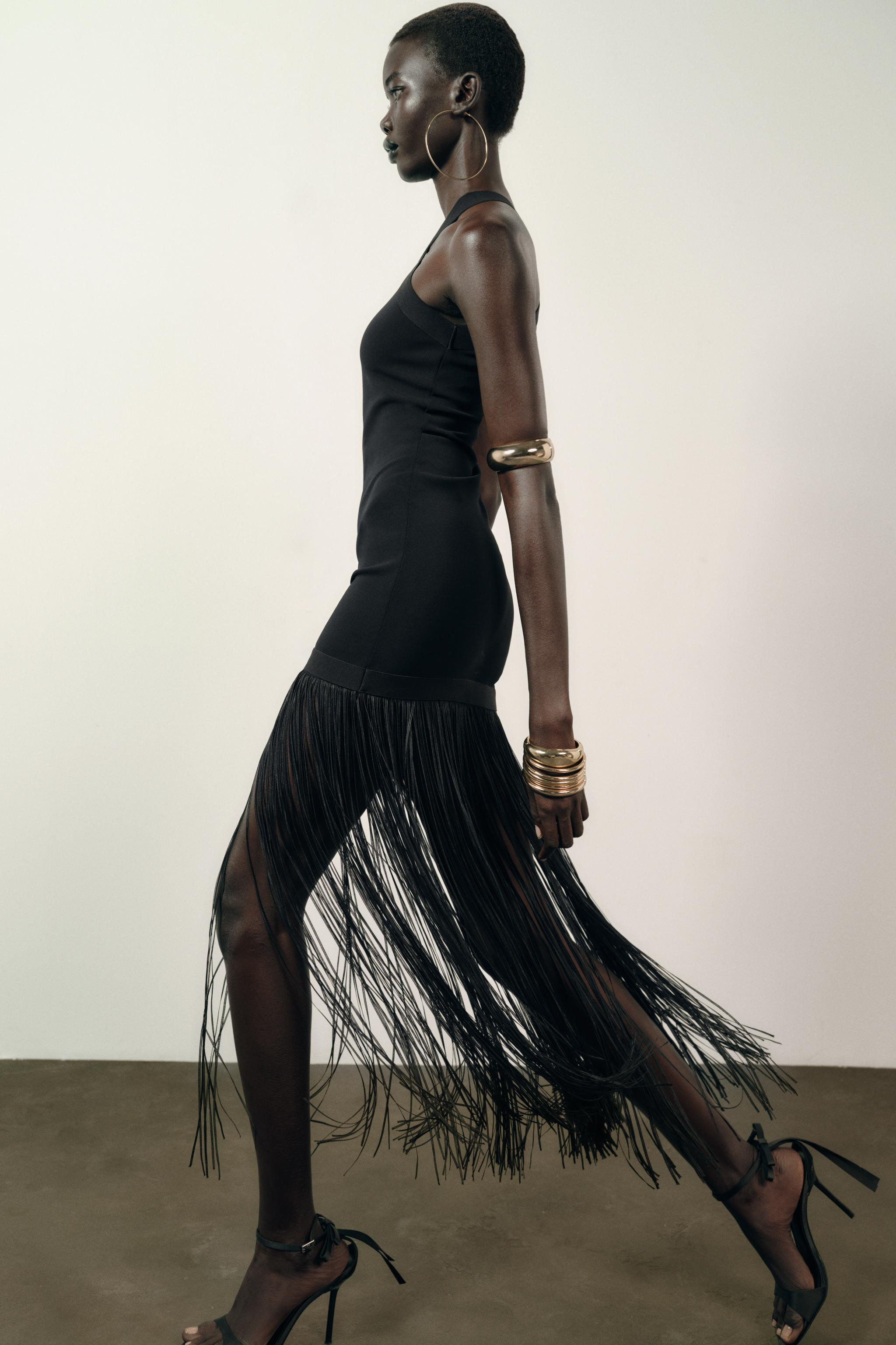 LONG STRETCH FRINGE DRESS$ 69.90Black | 5584/212/800Add to cartAddLong halter dress made in stret... | Zara US