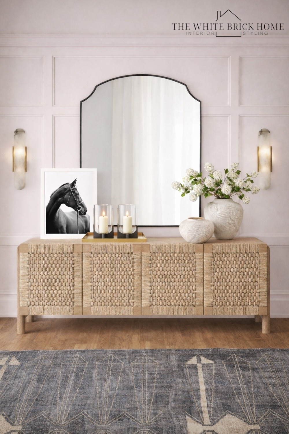 Timeless and refined - this natural woven console, arched mirror, and soft neutral styling create and effortlessly elegant entry that feels both warm and elevated. 
🖤🖤
Foyer, foyer inspiration, foyer furniture, media console, wall mirror, area rug, wall sconce, wall art, faux floral, vase, candle hurricane, home decor, home accessories, home decor ideas, buffet table, media console, area rug, dining room furniture, Etsy, pottery barn, lumens, crate and barrel 


#LTKSeasonal #LTKSaleAlert #LTKHome