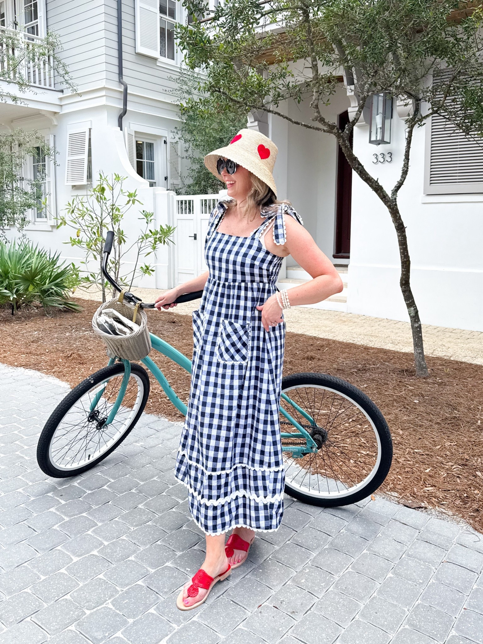 What I Wore in 30A 🏝️ Accessories are always my favorite part! This dress is selling fast. Wearing size small. I received so many compliments on my heart hat! 

#LTKOver40 #LTKSummerEdit #LTKStyleTip