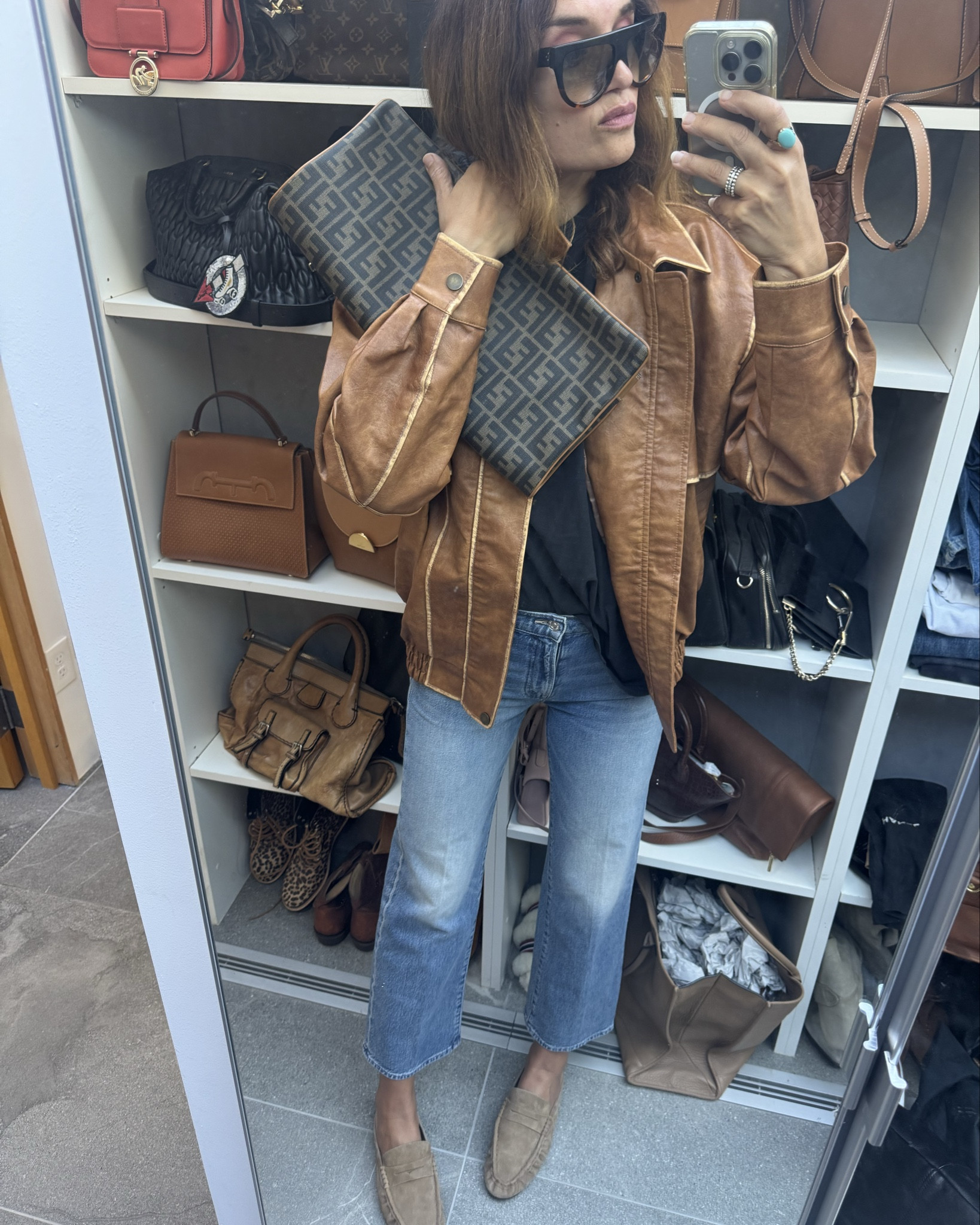 Jacket runs oversized 
Jeans tts 
Mules tts 