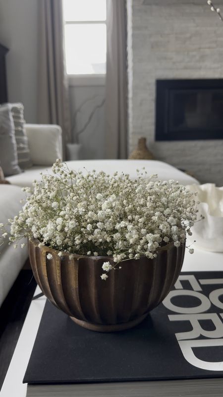 Coffee table styling

Coffee table book, candlestick, baby’s breath 

#LTKhome #LTKstyletip