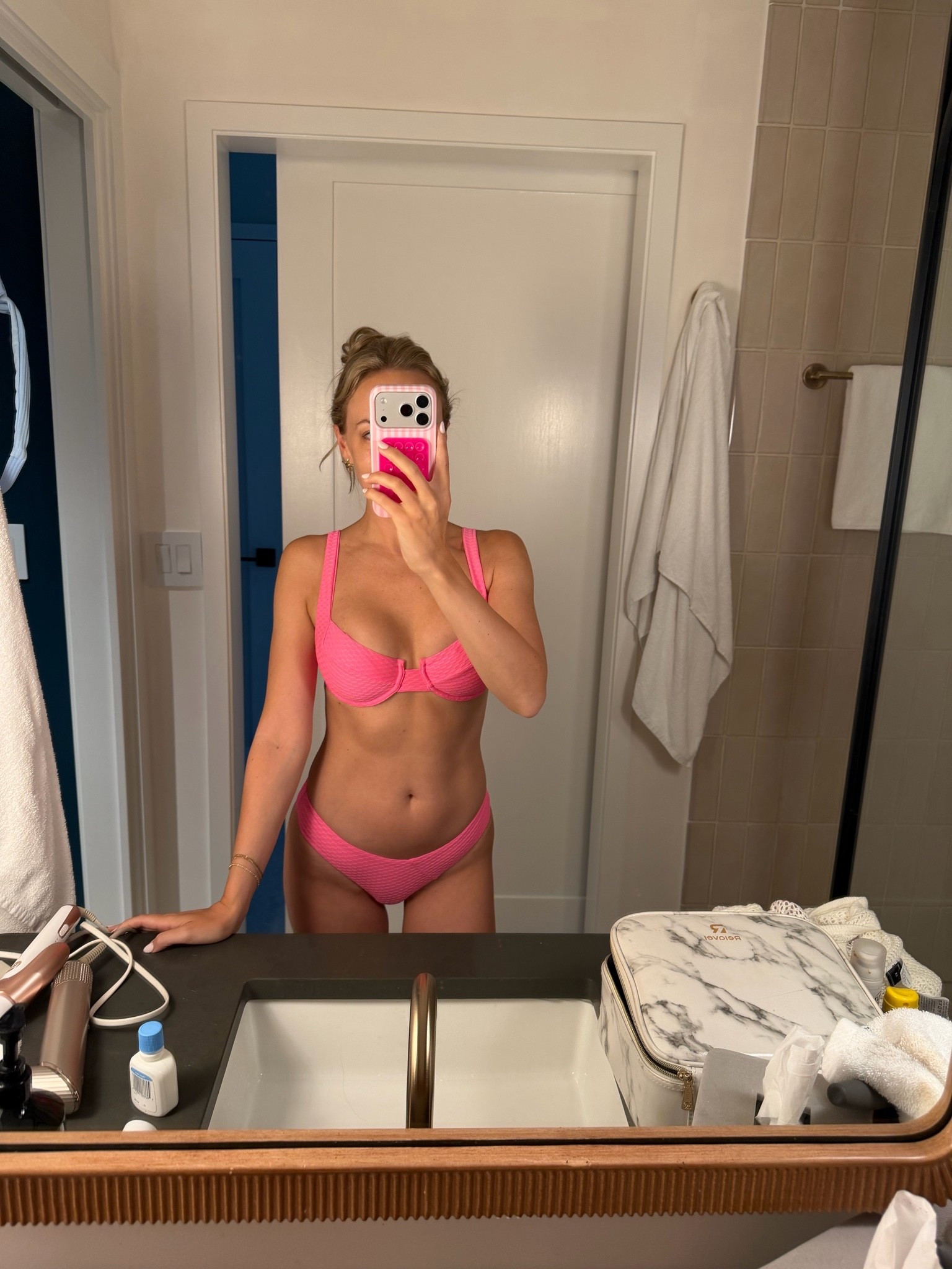 Wearing a size small in the top and XS in bottoms!
