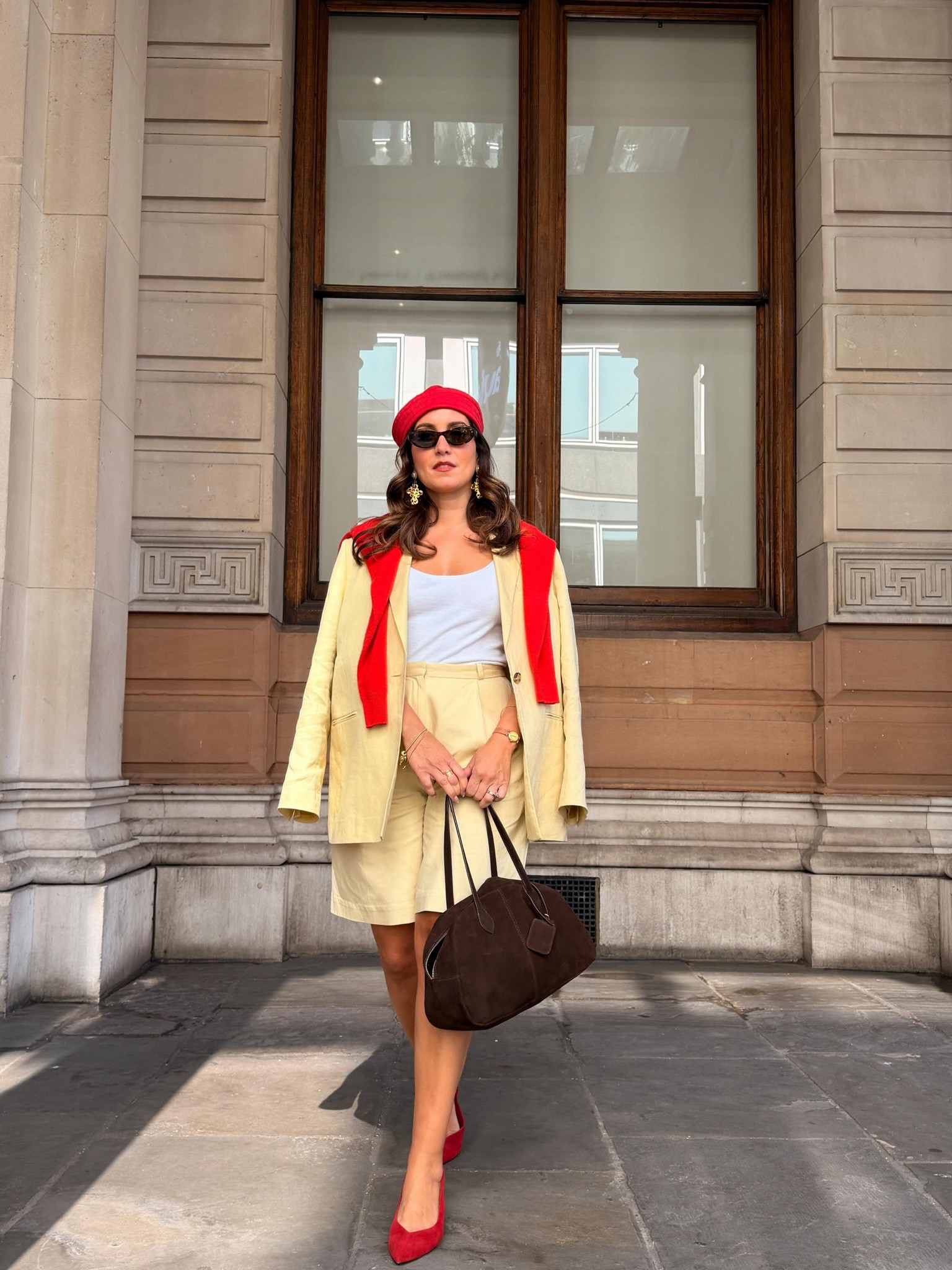 Wearing colour like it’s my job 🍋❤️ Sometimes the boldest outfit choices are the ones that make you smile the most and this one had me smiling all day!

Yellow Blazer @cosstores 
Bermuda Shorts @topshop 
*Red cashmere jumper @palome 
*Brown suede bag @monsoon 
Red Twill Hat @inesisaias x @nakdfashion 
*Sunglasses @prada @davidclulow 
Watch vintage @cartier 
Red suede court shoes @zara 
*gifted

#londonstyle #fashionover30 #colourfuloutfit #springoutfitideas #dailyoutfits