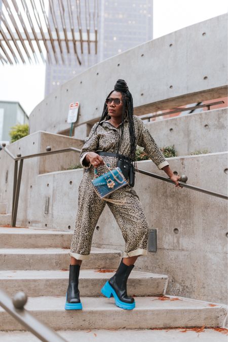 Leopard print jumpsuit with lug sole boots 

#LTKstyletip #LTKunder100 #LTKshoecrush