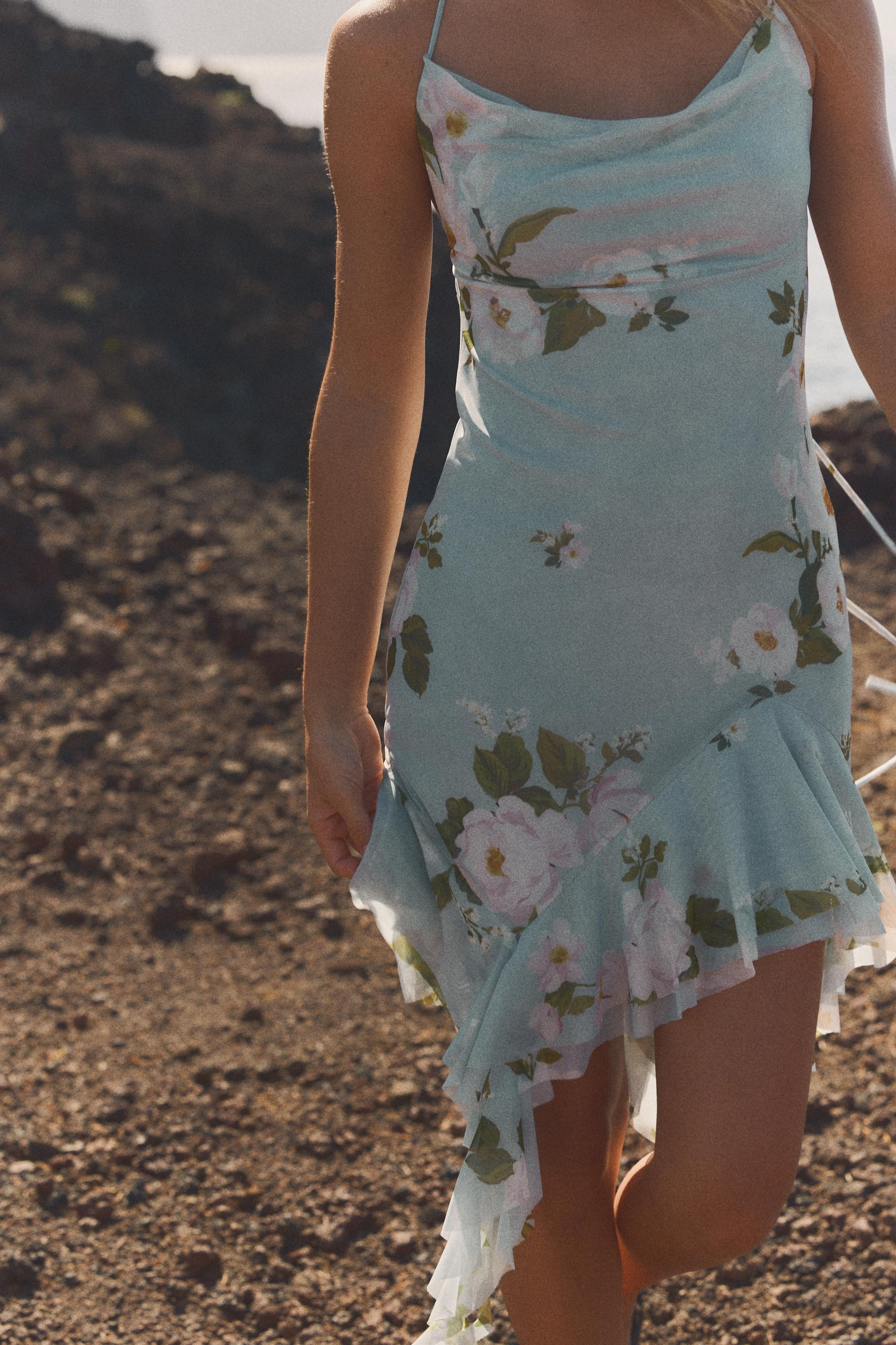 Short dress with cowl neck and adjustable halter straps. Interior lining. Asymmetrical ruffled he... | Zara Canada