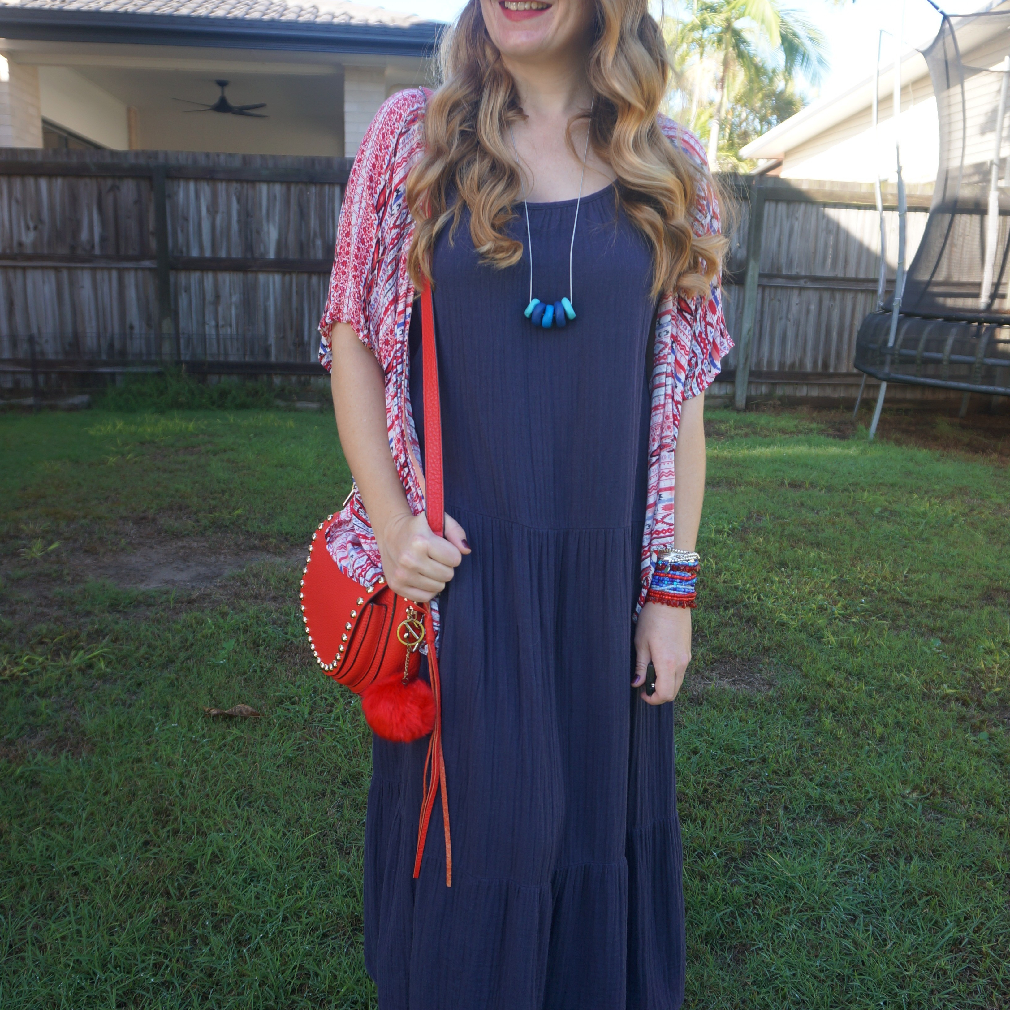 Navy tiered Kmart Anko maxi dress with red printed cover up and Rebecca Minkoff red saddle bag ❤️

#LTKaustralia #LTKautumn #LTKbag