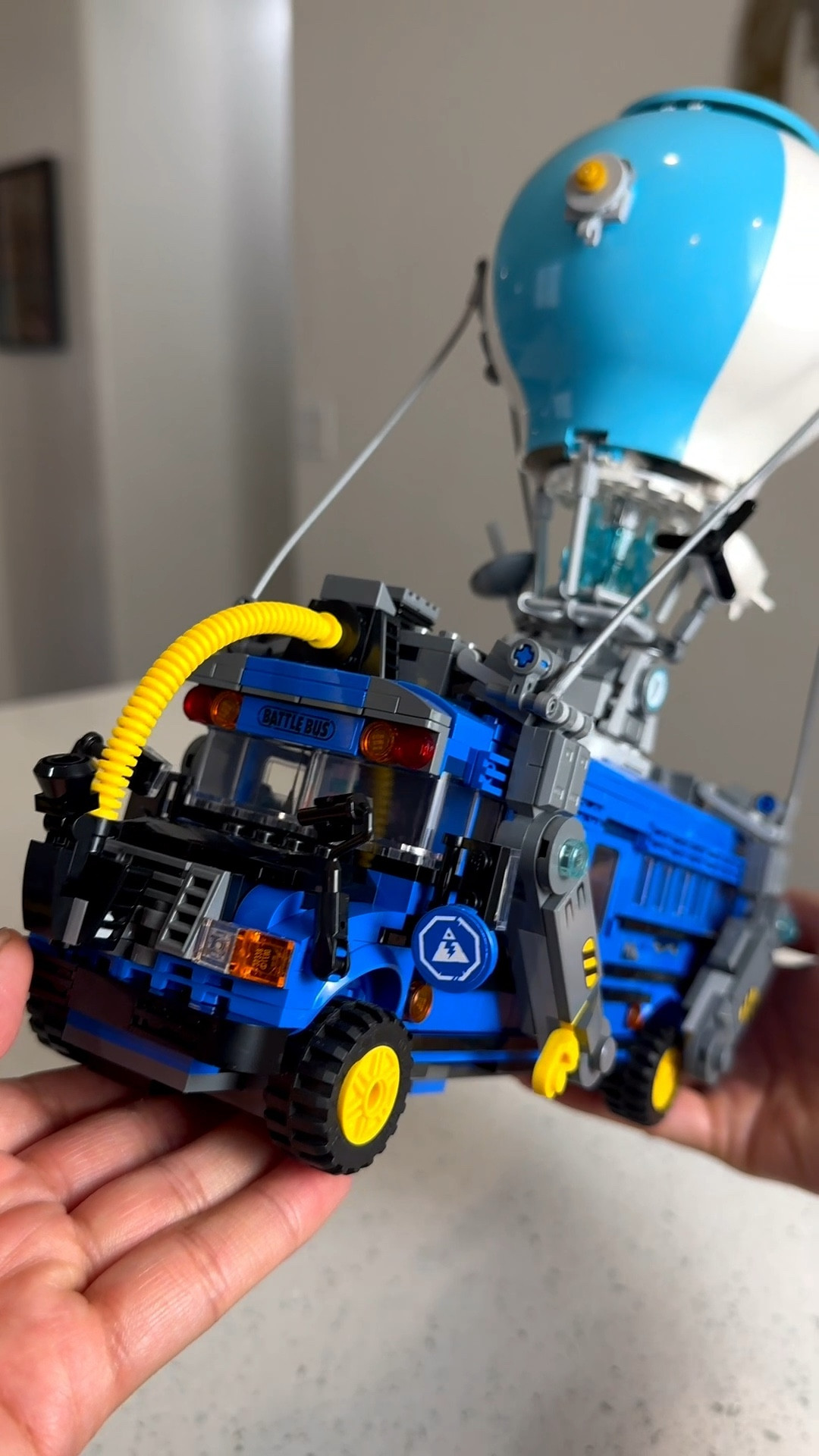 The Fortnite battle bus LEGO build, it’s pretty detailed and makes cool decor for a kids room! 

#LTKKids #LTKHome