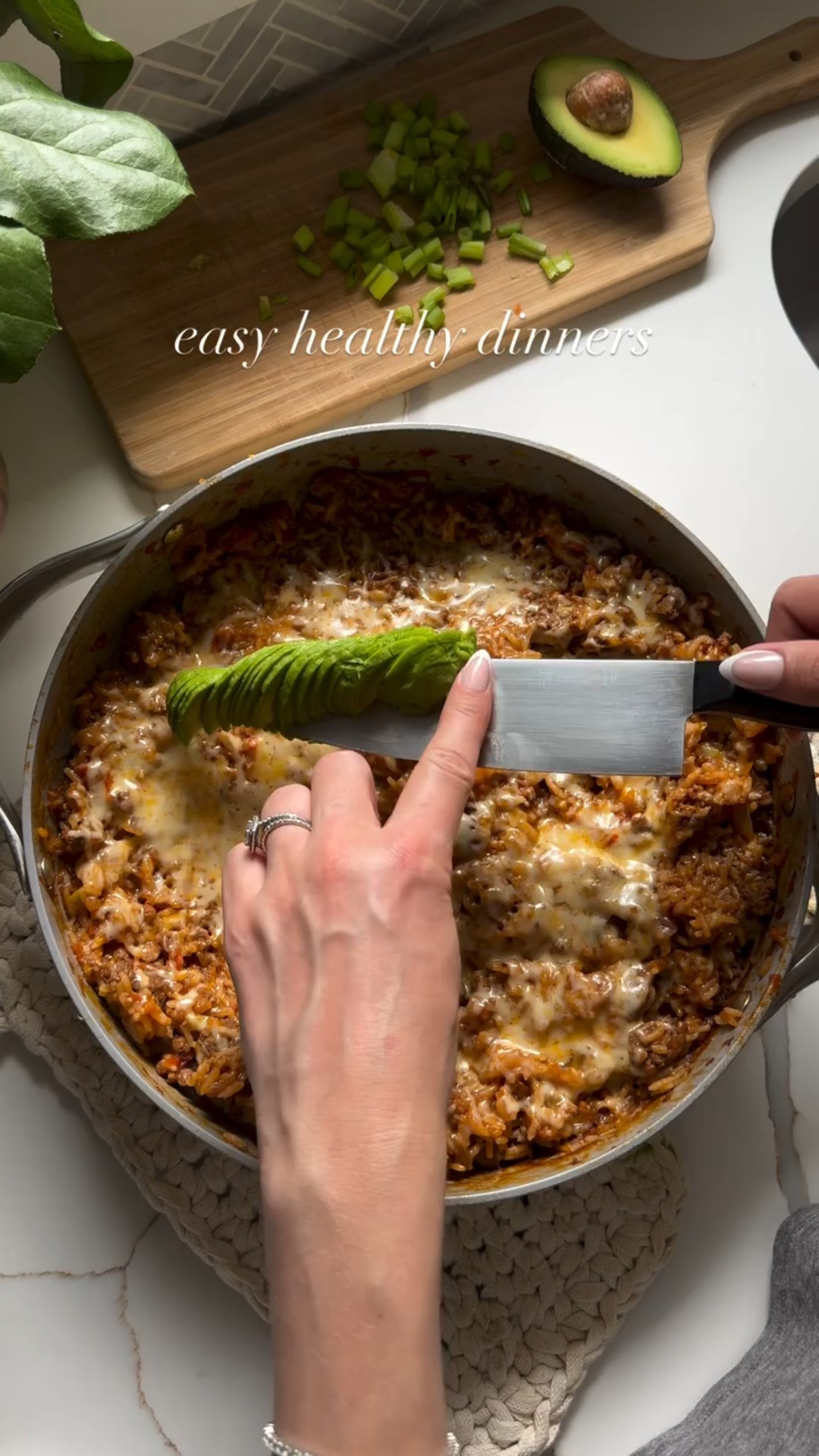 If you like a cheesy gooey high protein dinner look no further. This is SO good and so flavorful thanks to the soyaki sauce and the broth. 

Save this for an easy weeknight dinner!

Follow @fridasofiaeats + comment “Recipe” and I’ll send you a link to the recipe

2 bell peppers, diced
1 yellow onion, diced
4 scallions, cut up and separate white from green parts 
1 lb ground beef 
2 tbsp tomato paste
1/2 cup soyaki sauce 
1 cup basmati rice, washed and rinsed
2 cups beef broth, using @lonolifeinc powder broth here
1 cup Mexican cheese blend
Optional: serve with avocado 🥑

1. Add diced bell peppers and onion to a large pan in some olive oil over medium heat. Sauté for a few minutes before adding white parts of green onions and ground beef. Break up beef and mix every thing.  Add white parts of green onions.

2. Cook for a few minutes until beef starts to brown, then add soyaki sauce and tomato paste and mix to combine. Cook for another minute or two until the beef is almost fully cooked. Add rice and beef broth to pan. Mix to combine everything, then cook for 10-15 minutes on low heat with a lid until rice is done. Remove lid and stir a few times to make sure beef doesn’t burn. 

3. Remove lid, add half of the cheese and mix. Add the remaining cheese on top and add back lid for 30 seconds to let cheese melt.

4. Serve with avocado and green parts of green onions.