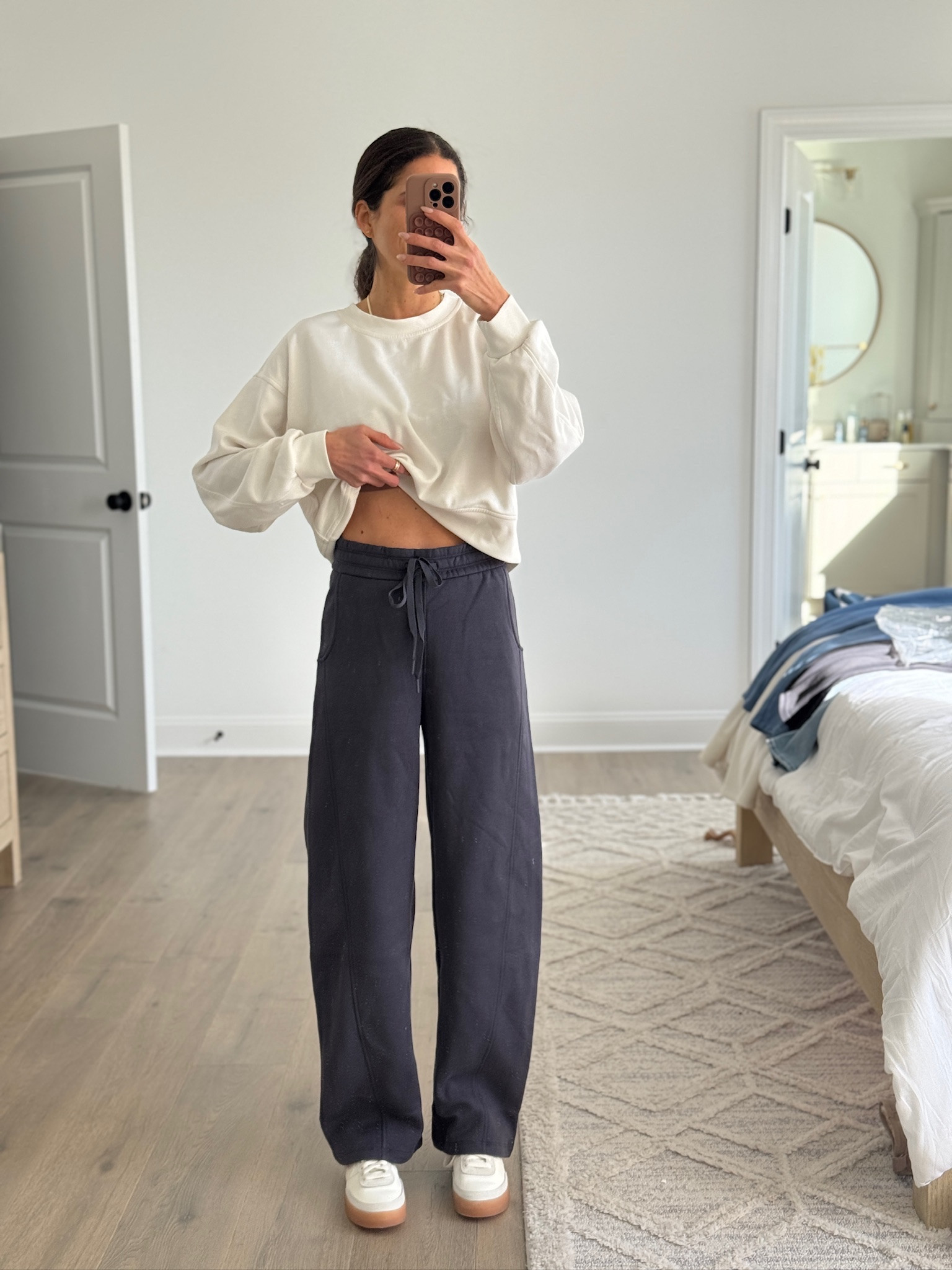 Comfortable everyday outfit that still feels put together. I love a relaxed sweatshirt paired with wide leg drawstring pants for an easy, casual look that works for school days, errands, travel, or lounging at home. These are the kinds of basics that mix and match effortlessly and get worn on repeat. Simple, comfortable, and practical for real life.

#LTKSeasonal #LTKmomlife #LTKootd