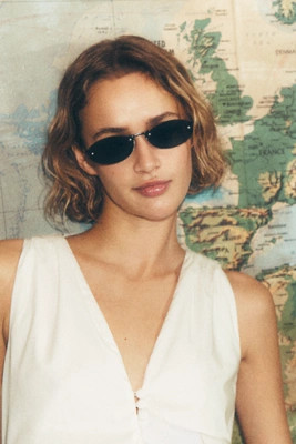 Elite Eyewear Frameless Oval Sunglasses | Anthropologie (US)