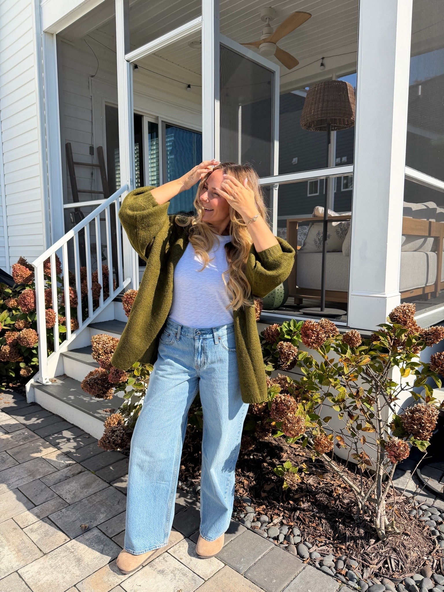 Olive cardigan season 🍂 The balloon sleeves make this feel so cozy without swallowing a petite frame. Paired it with a basic white tee and wide-leg jeans for an easy fall uniform. I'm 5'2" wearing a M in the cardigan and a 6 Short in the jeans 🤍