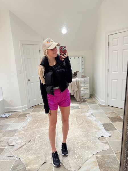 gym fit from the other day - free people shorts (I wear a S), cropped lulu long sleeve, trucker hat (linked similar), black puffer vest, and my hokas (linked similar). 

#LTKstyletip #LTKfit #LTKunder50